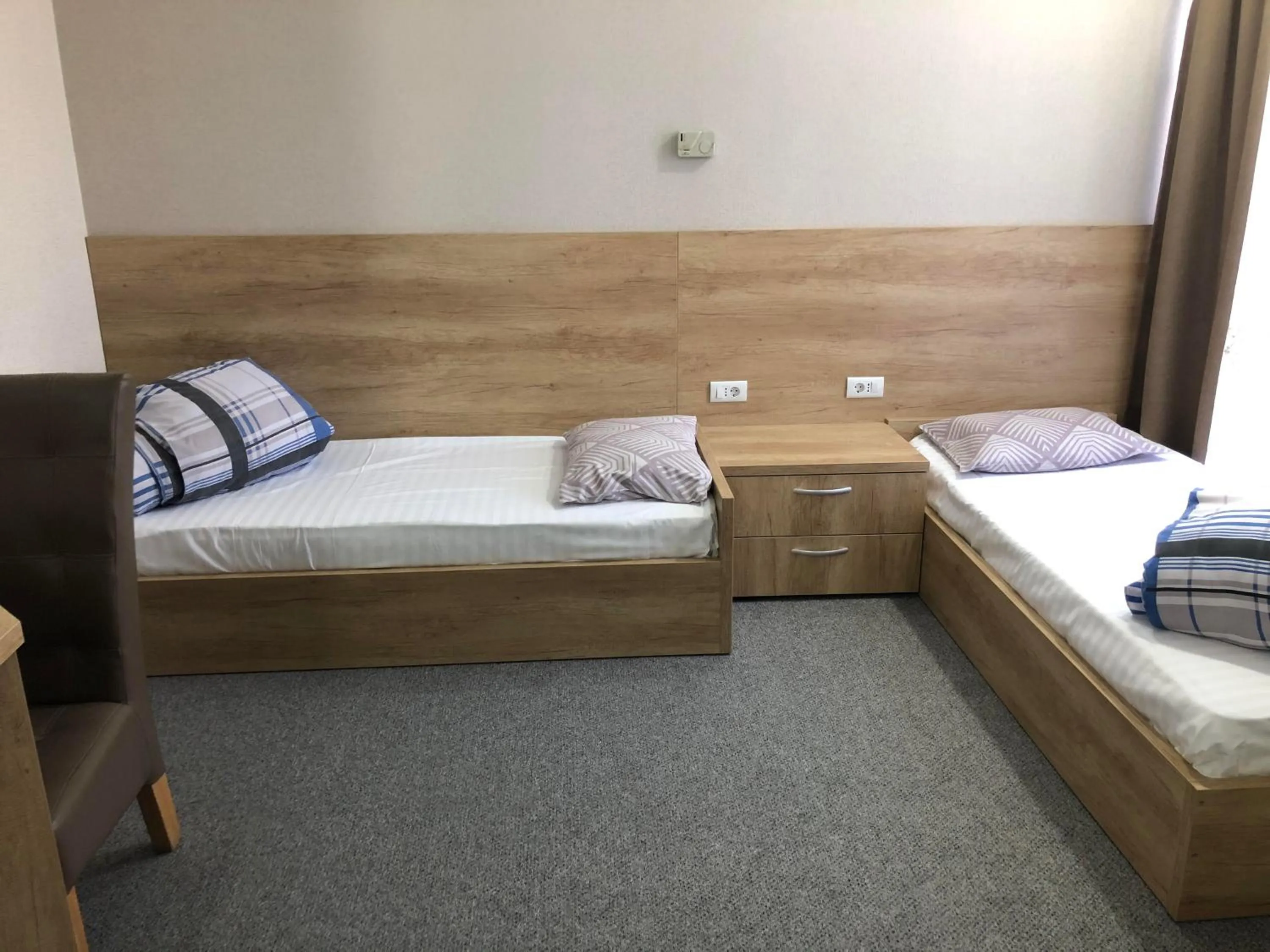 Photo of the whole room, Bed in Motel Carmen