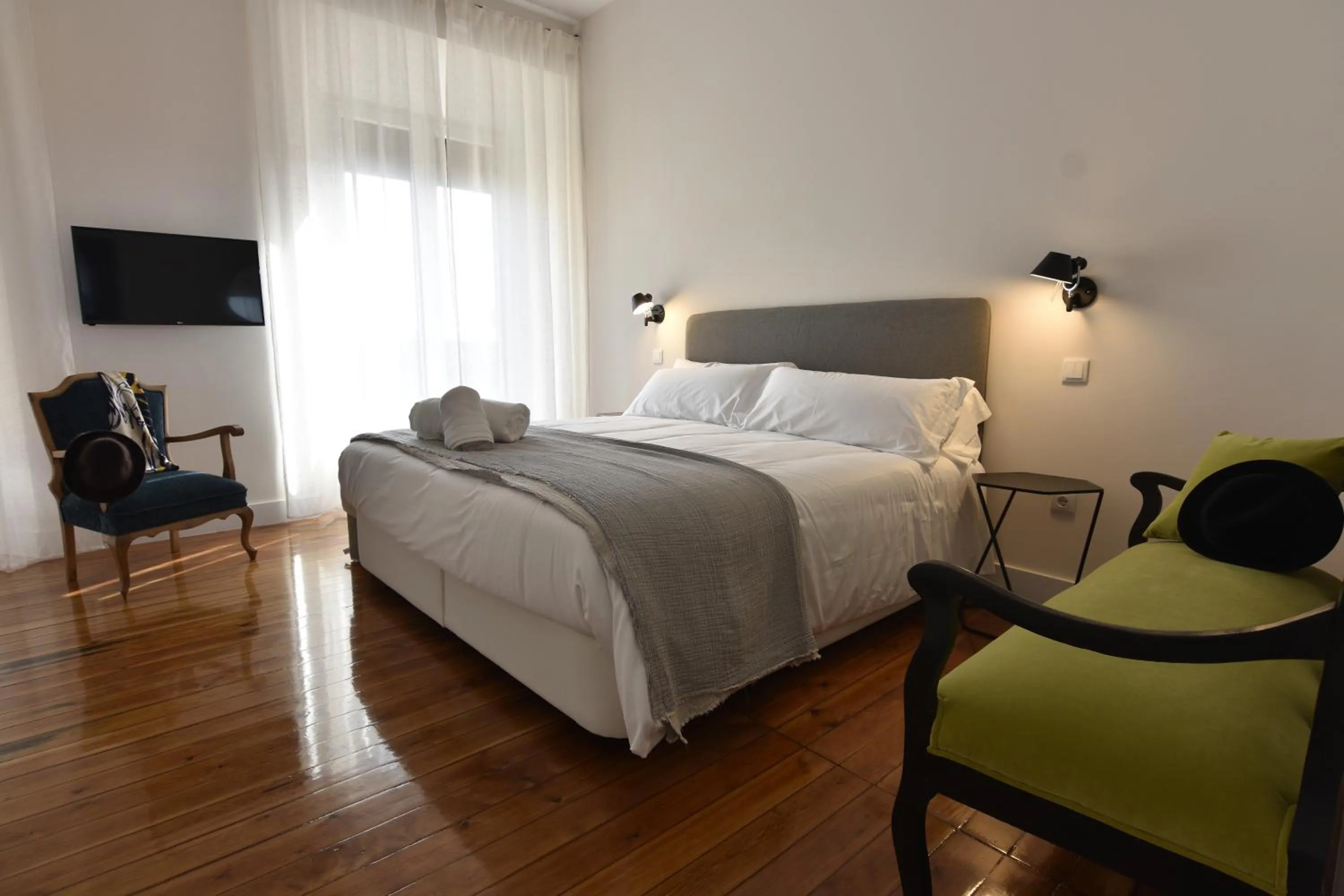 Bed in SANMARTINA HOTEL