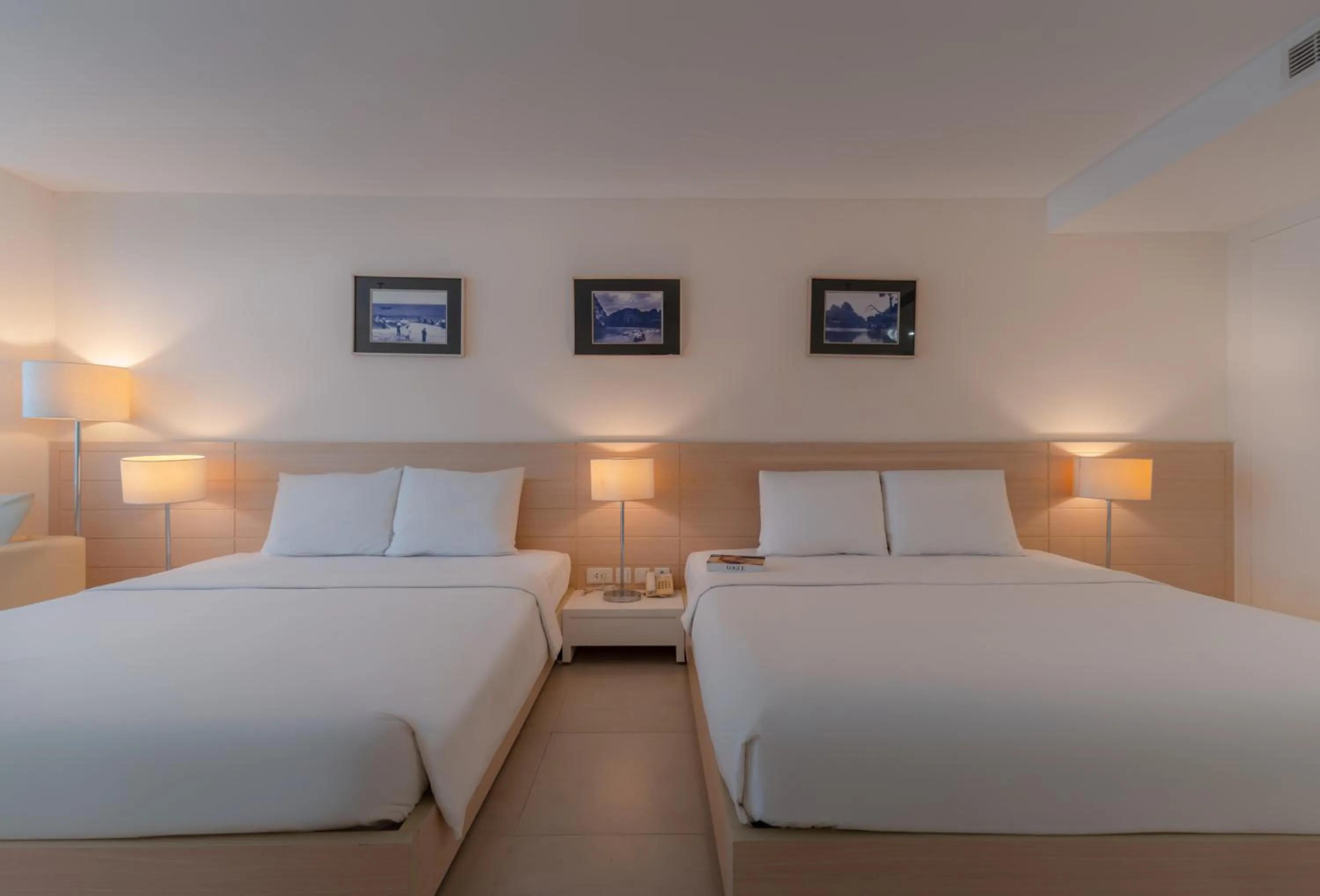 Bed in Nhi Phi Hotel