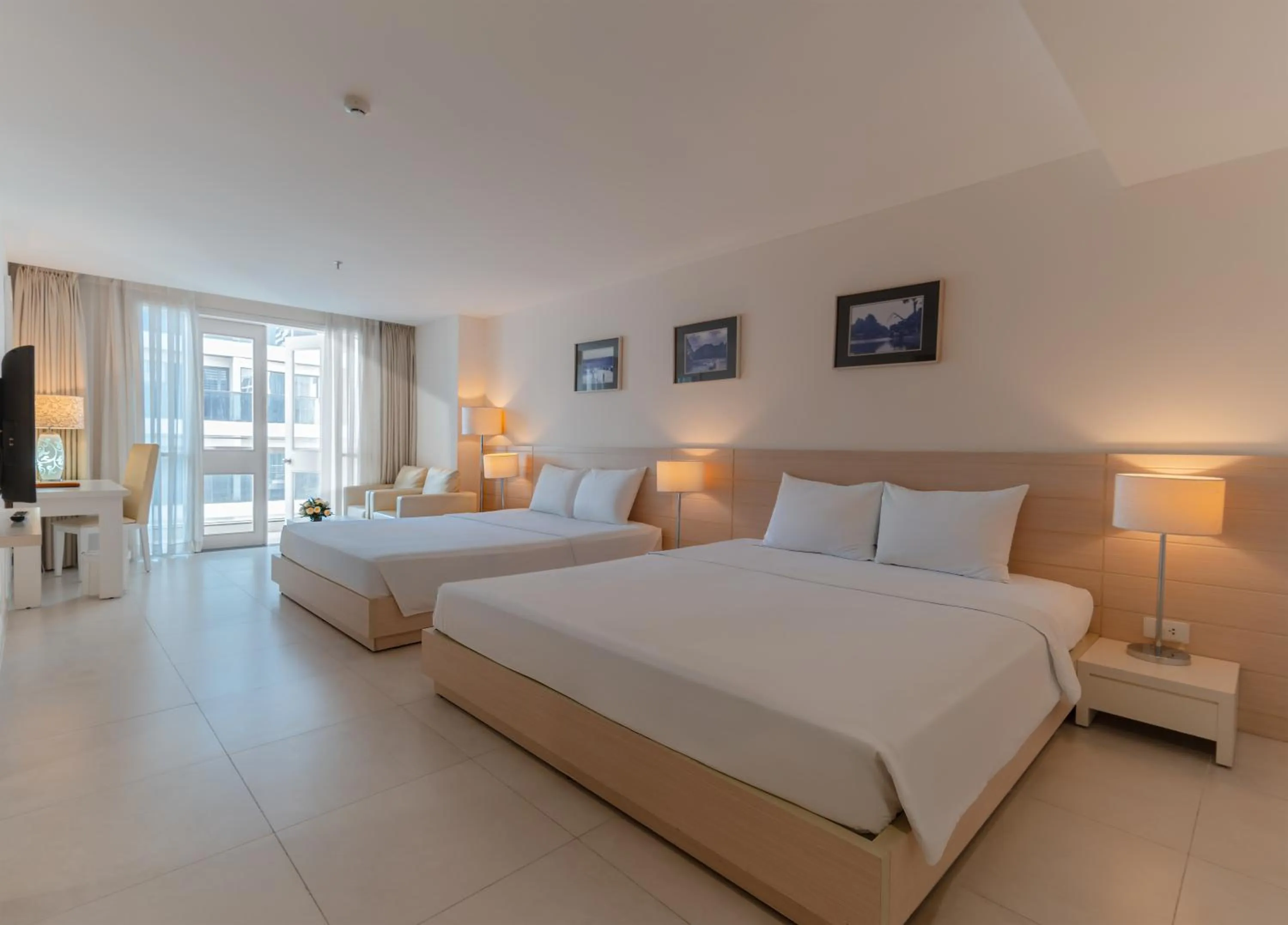 Photo of the whole room, Bed in Nhi Phi Hotel