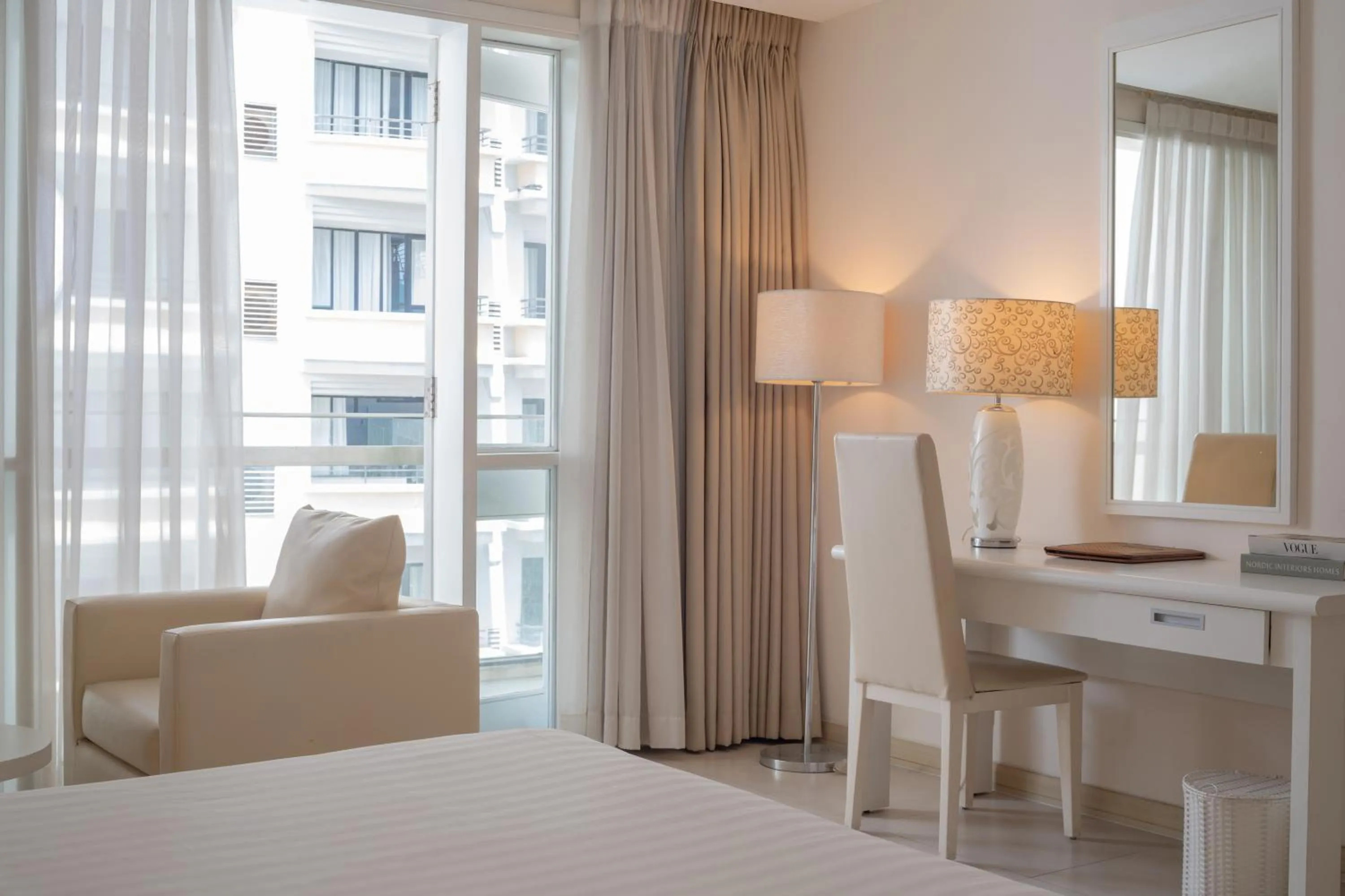 Seating area, Bed in Nhi Phi Hotel