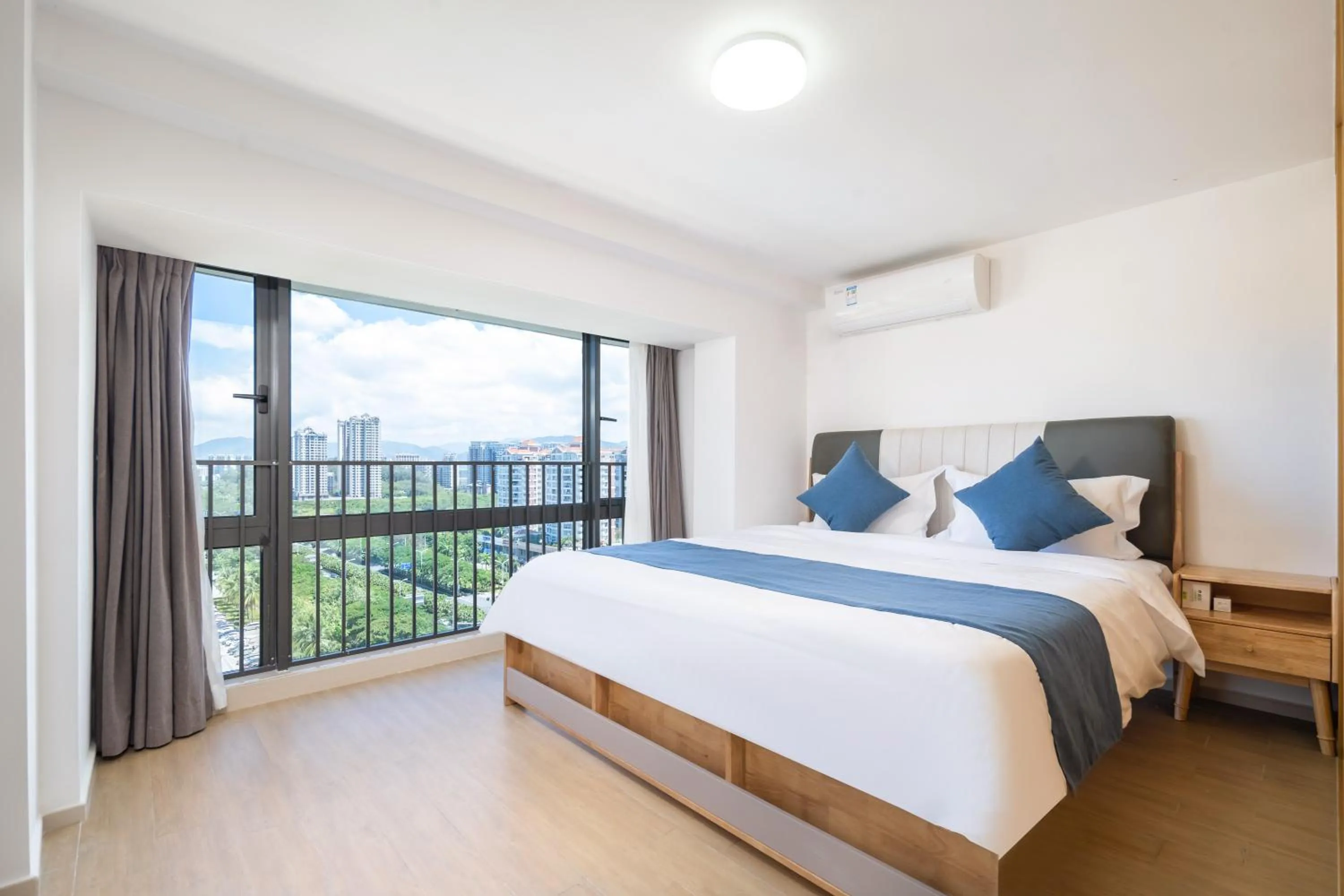 Bedroom, Bed in Neal Yat Seaview Apartment Haitang Bay Sanya