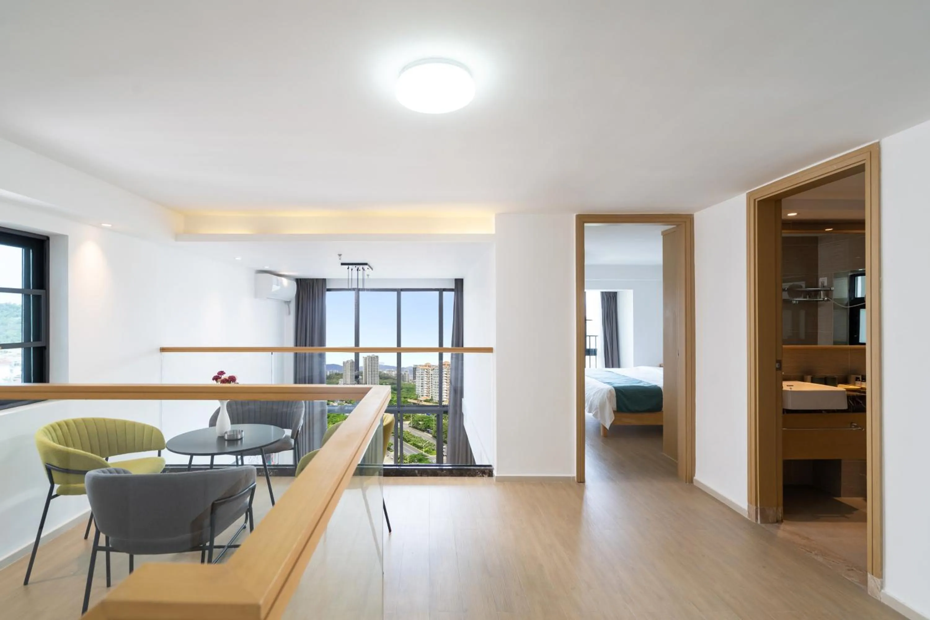 Seating area, Bed in Neal Yat Seaview Apartment Haitang Bay Sanya