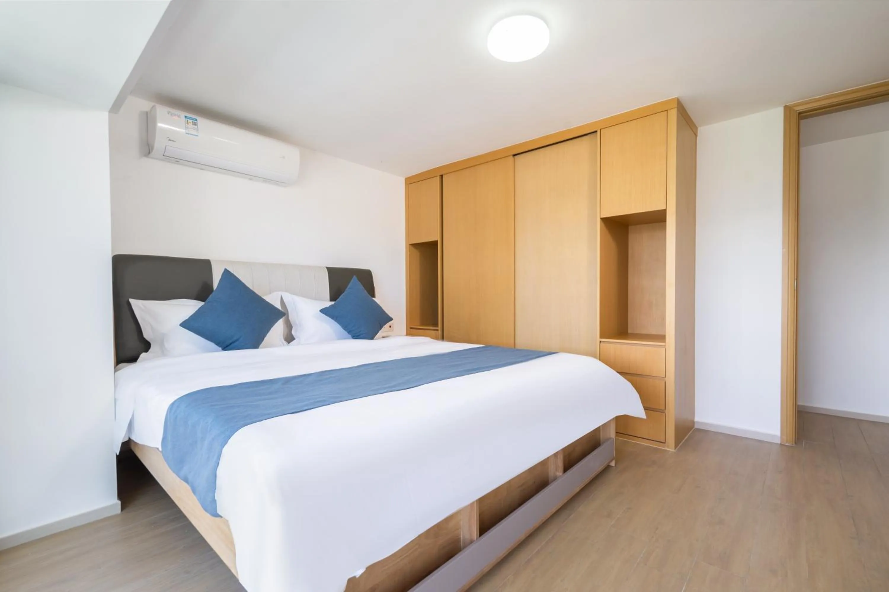 Bedroom, Bed in Neal Yat Seaview Apartment Haitang Bay Sanya