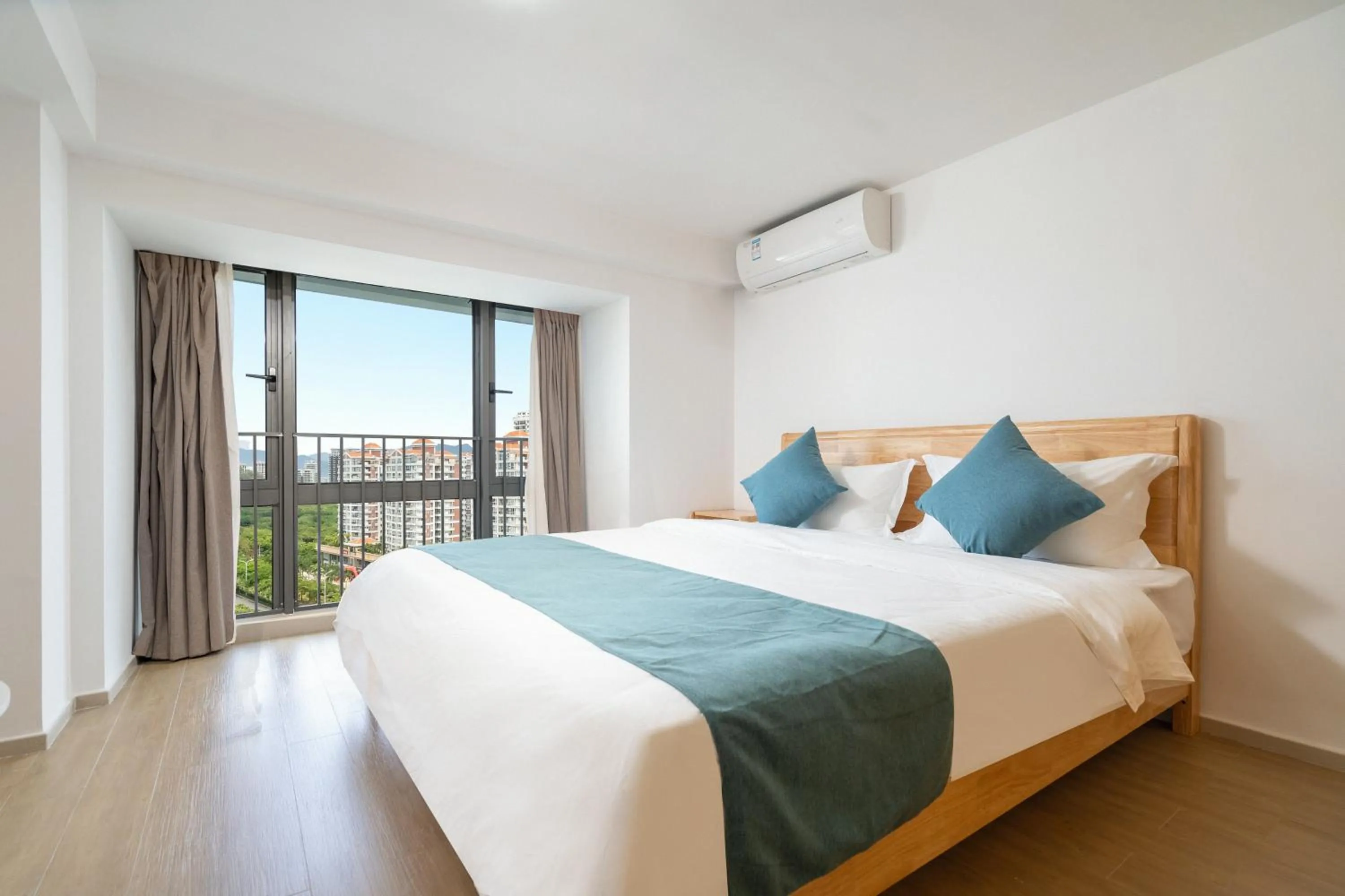 Bedroom, Bed in Neal Yat Seaview Apartment Haitang Bay Sanya