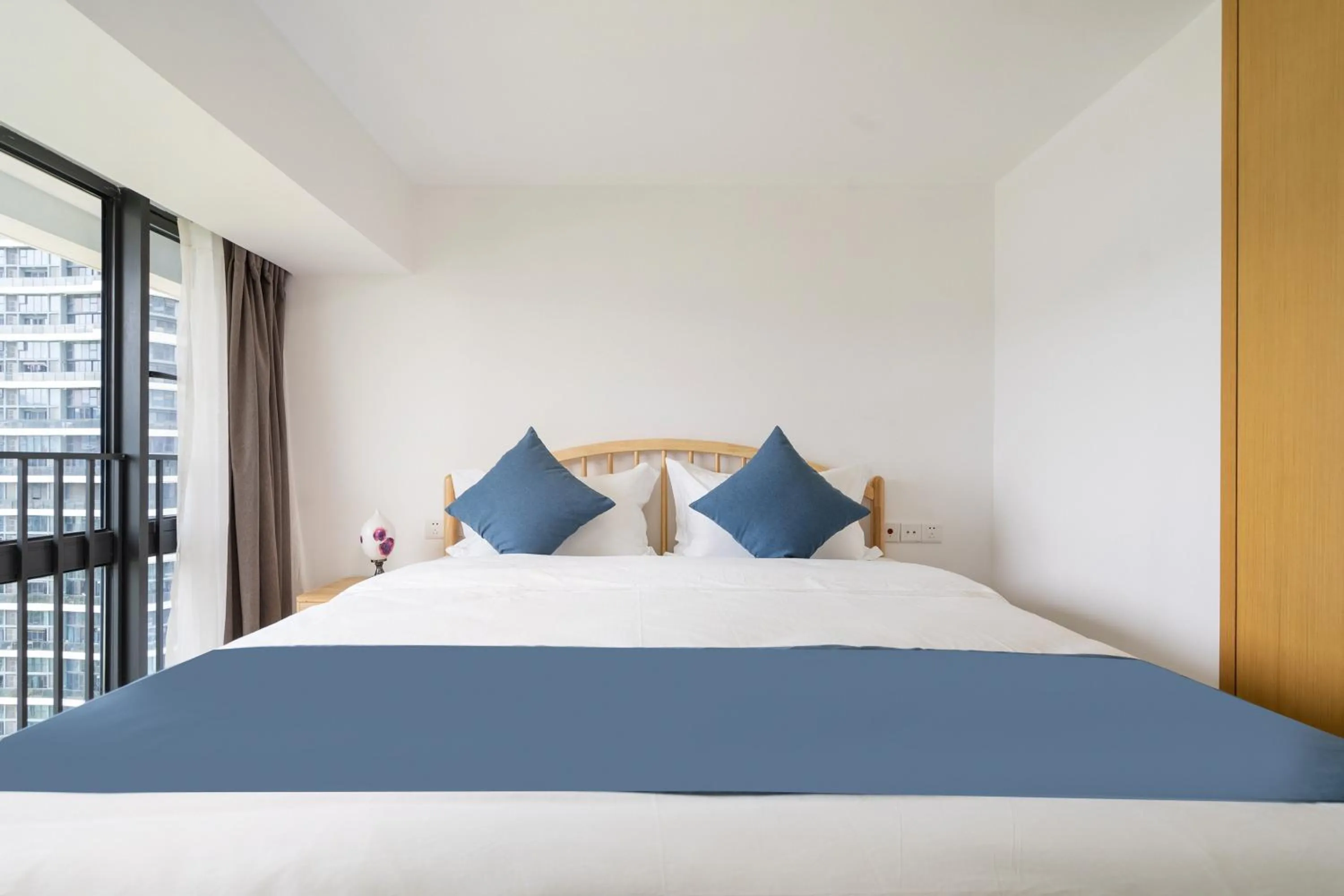 Bedroom, Bed in Neal Yat Seaview Apartment Haitang Bay Sanya