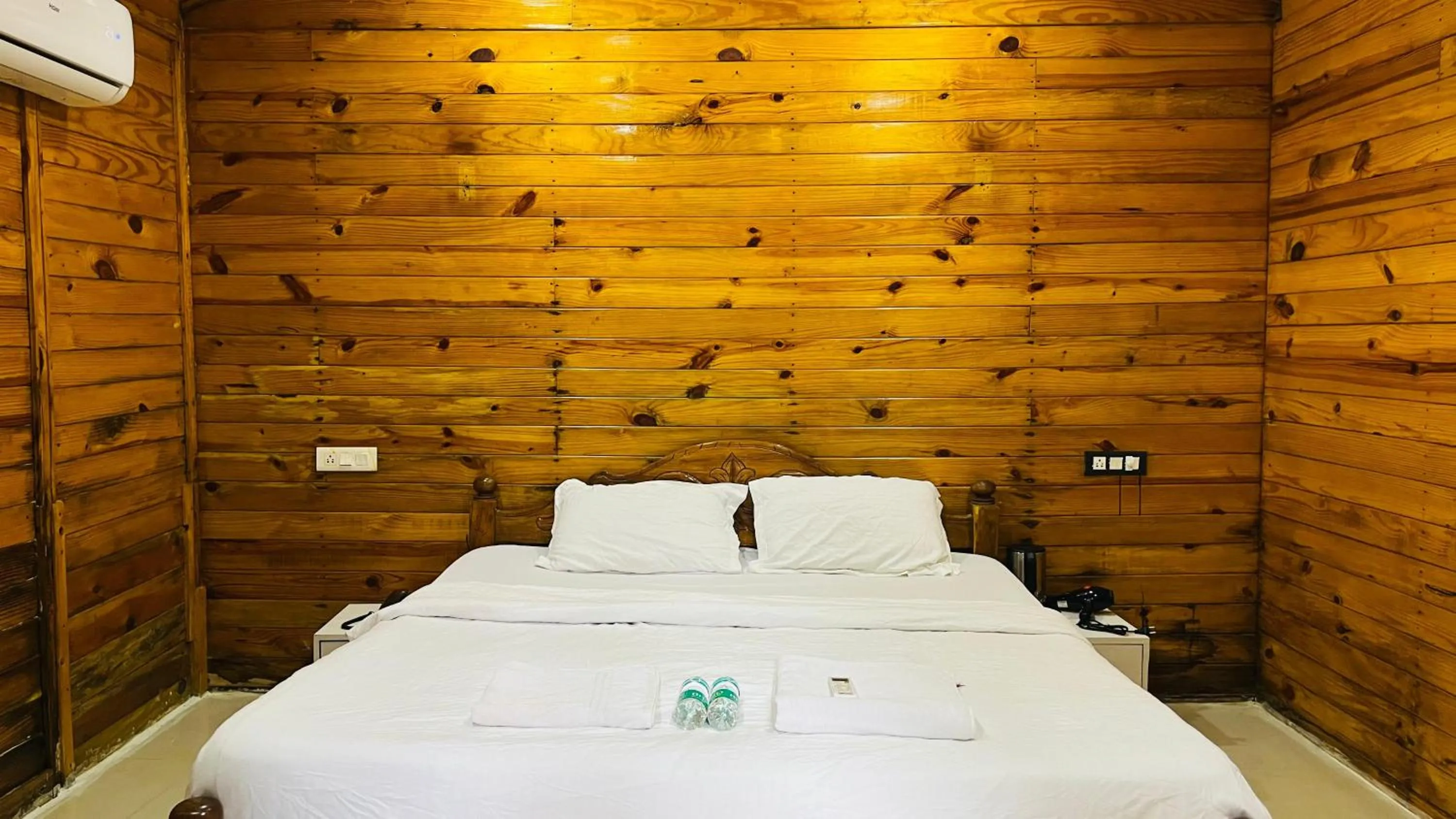 Bed in Palolem Luxuries Beach Cottages