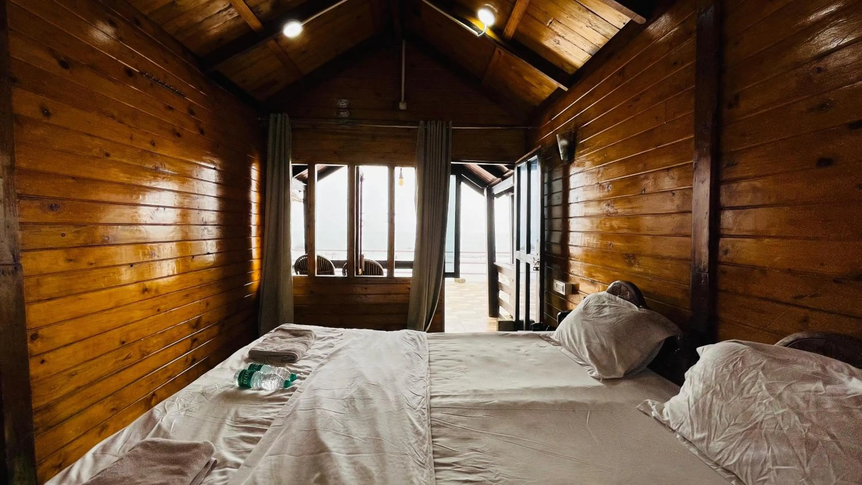 Bed in Palolem Luxuries Beach Cottages