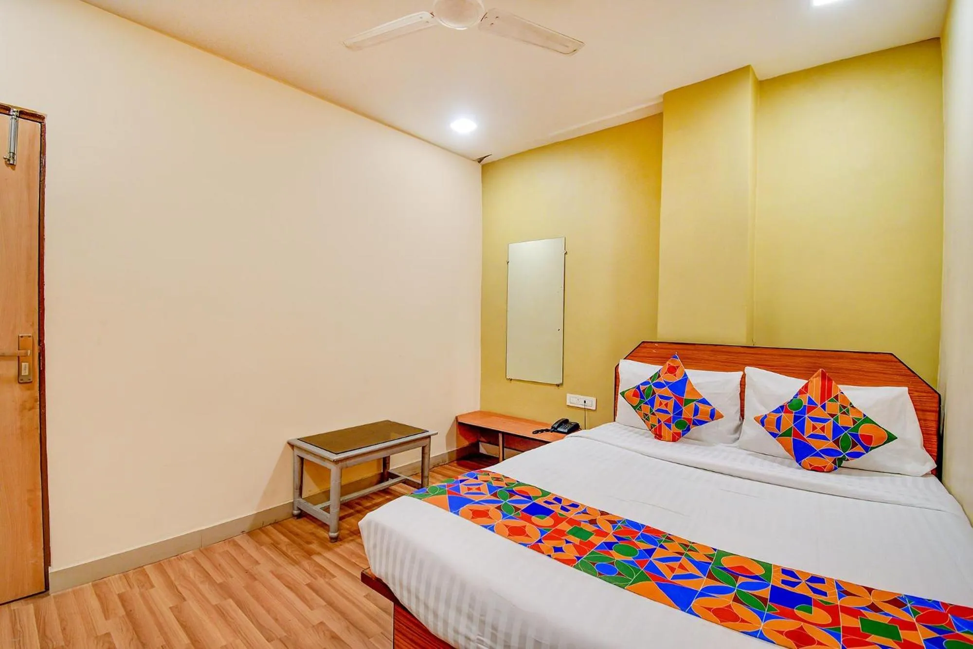 Bed in FabHotel Kamala Inn