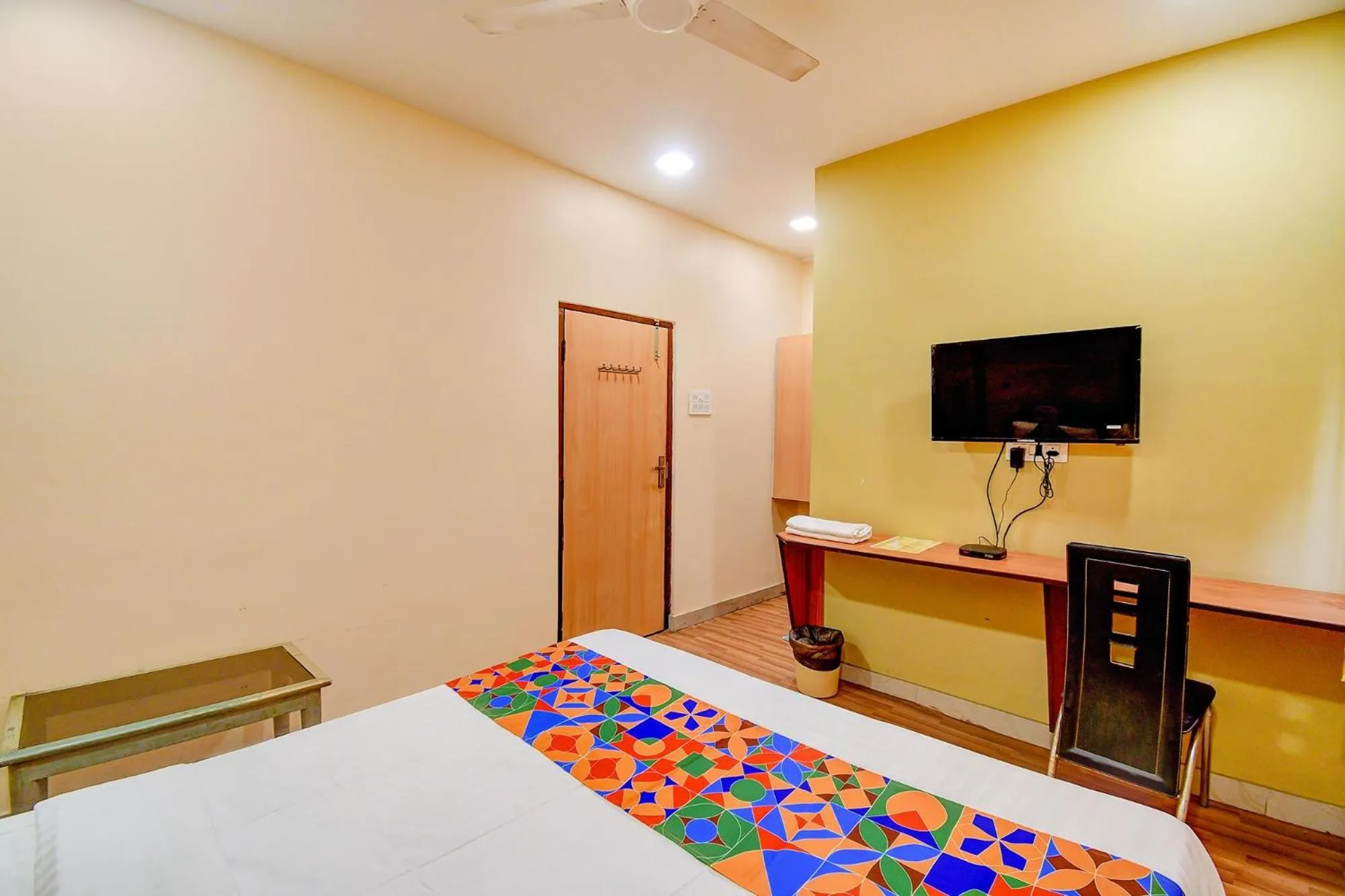 Bed in FabHotel Kamala Inn