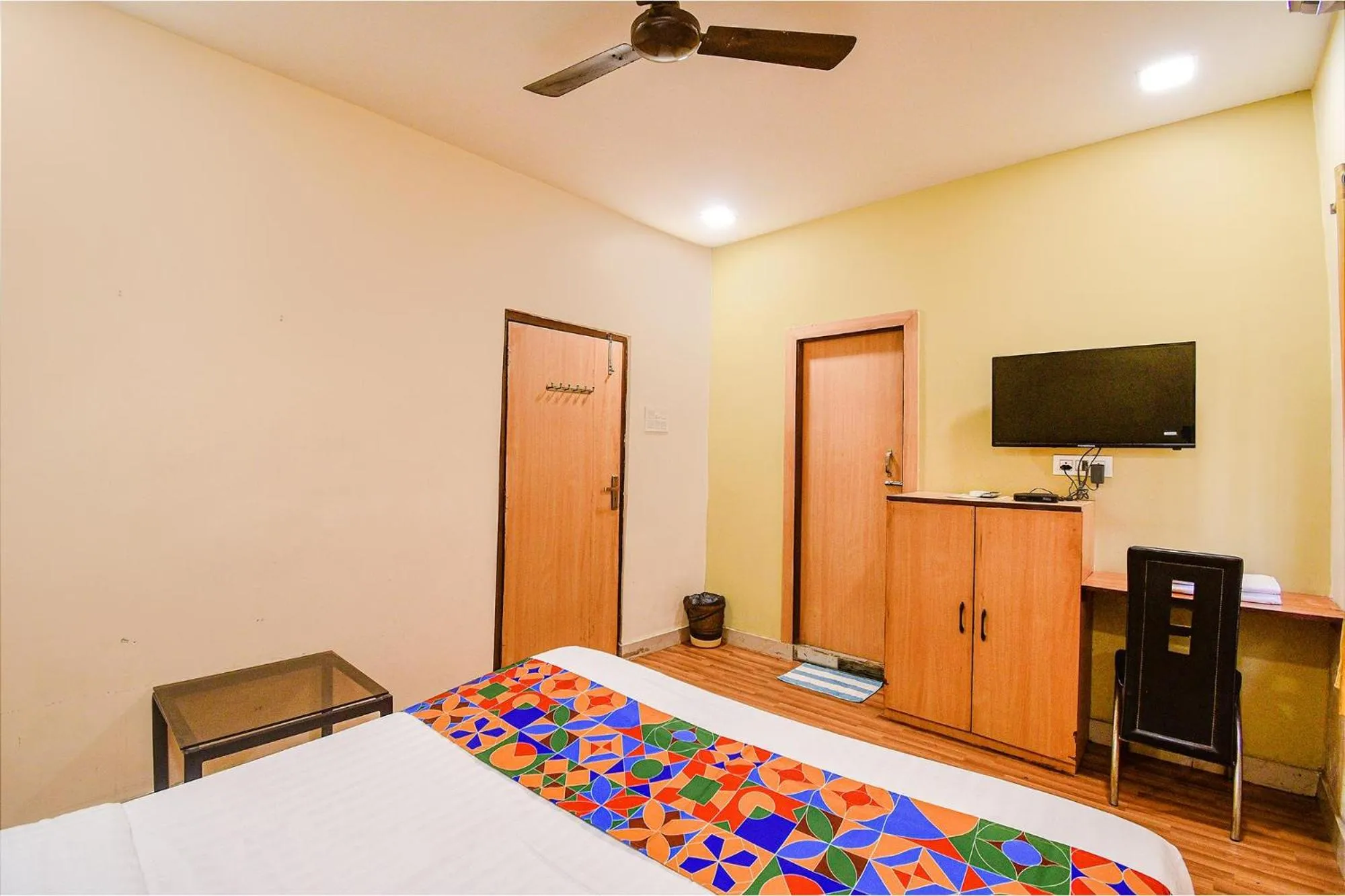 Bed in FabHotel Kamala Inn