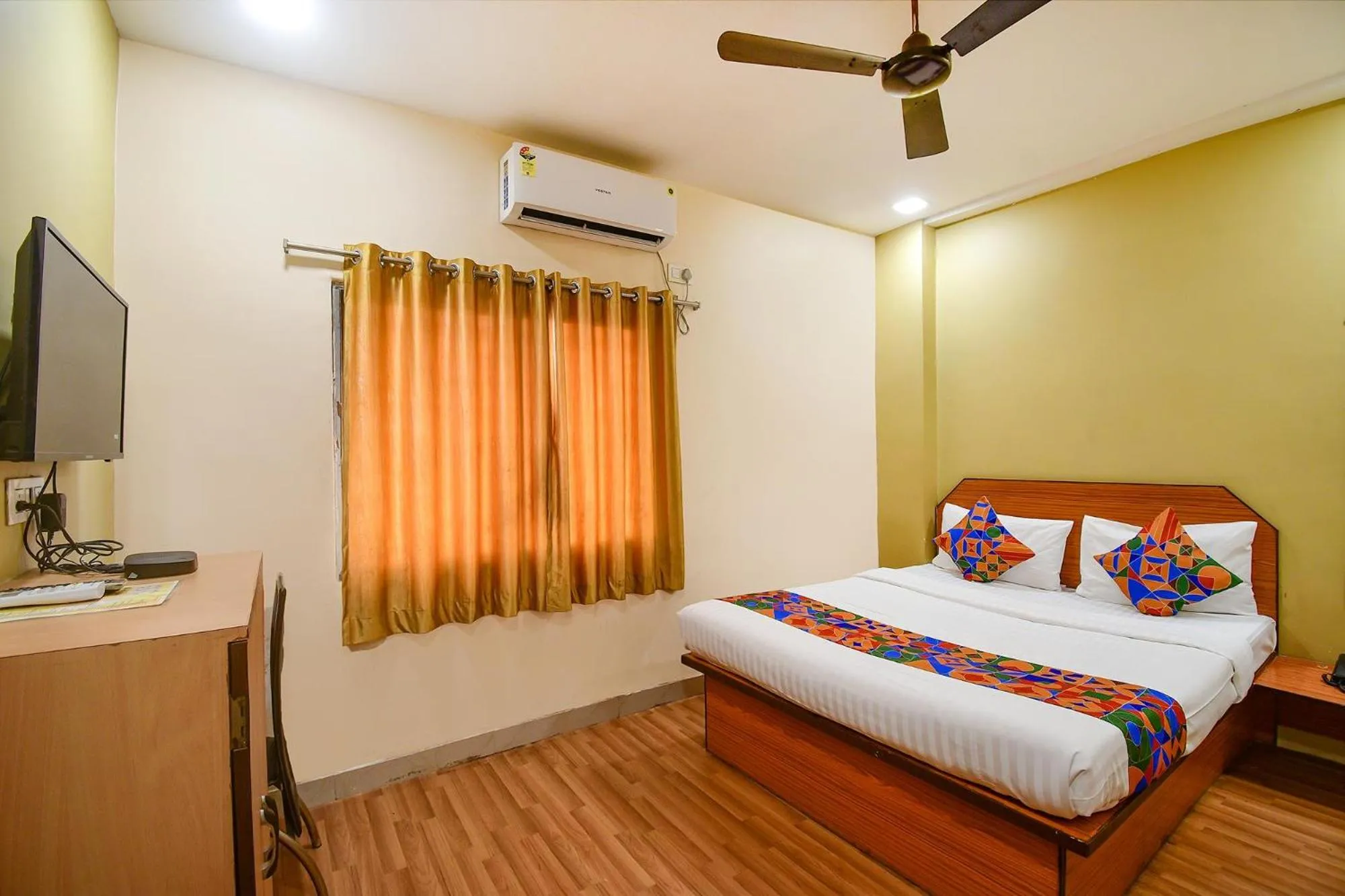 Bed in FabHotel Kamala Inn