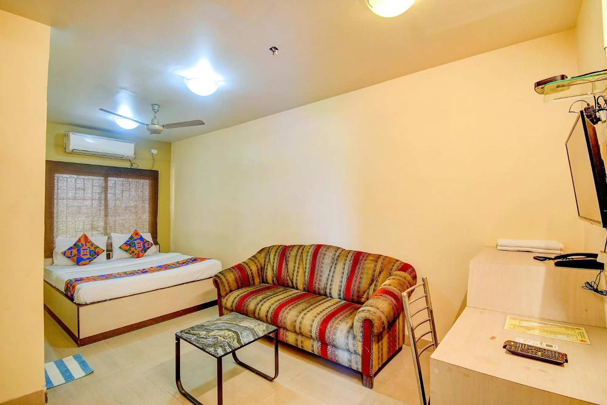 Bed in FabHotel Kamala Inn