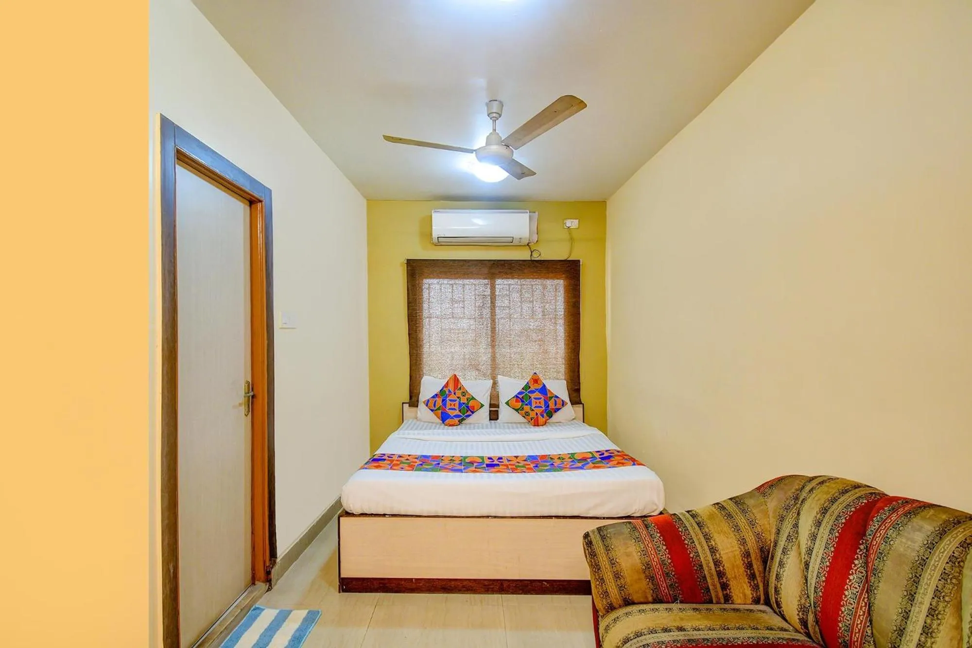 Bed in FabHotel Kamala Inn