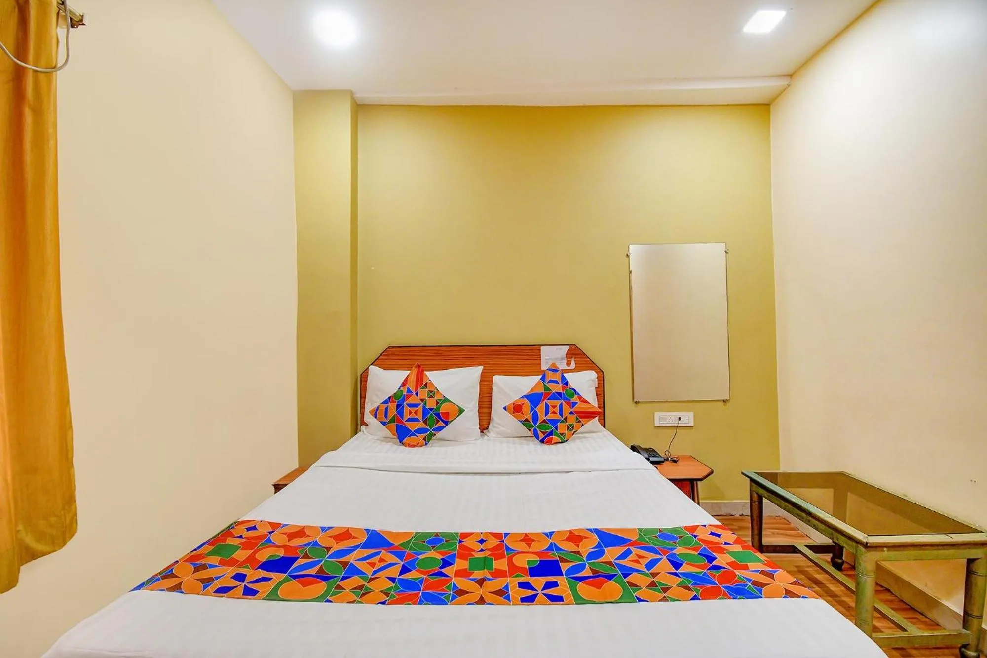 Bed in FabHotel Kamala Inn