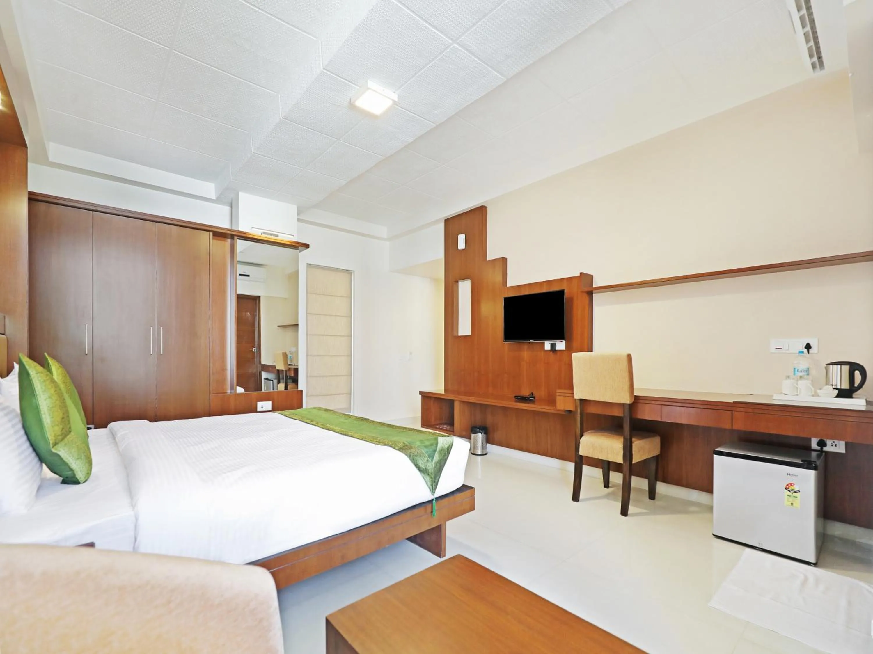 Bed in Treebo Akshaya Bull Temple