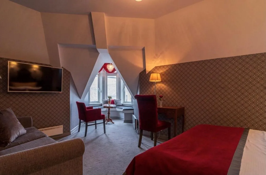 Photo of the whole room, Bed in Grand Hotel Flekkefjord