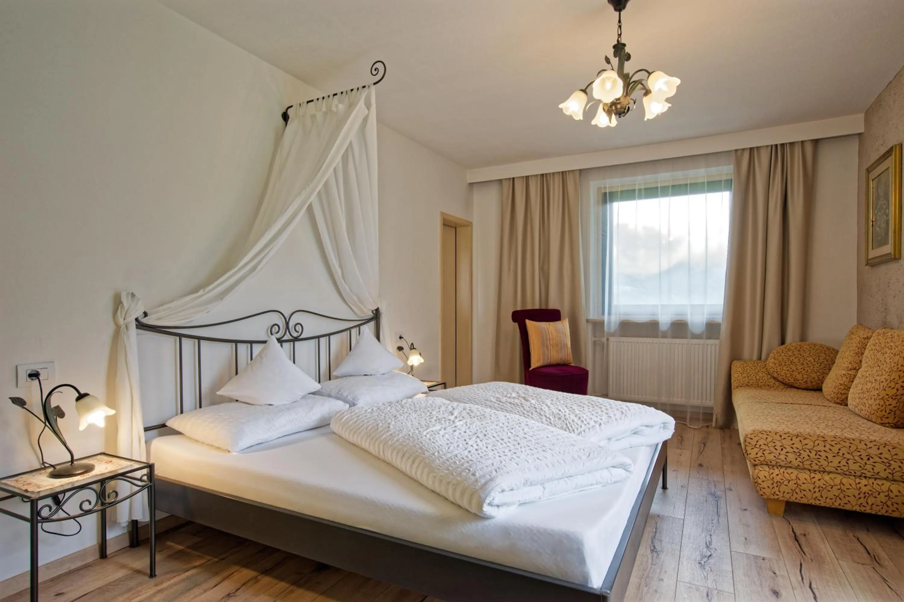 Bed in Bergchalet Hotel Reinerhof