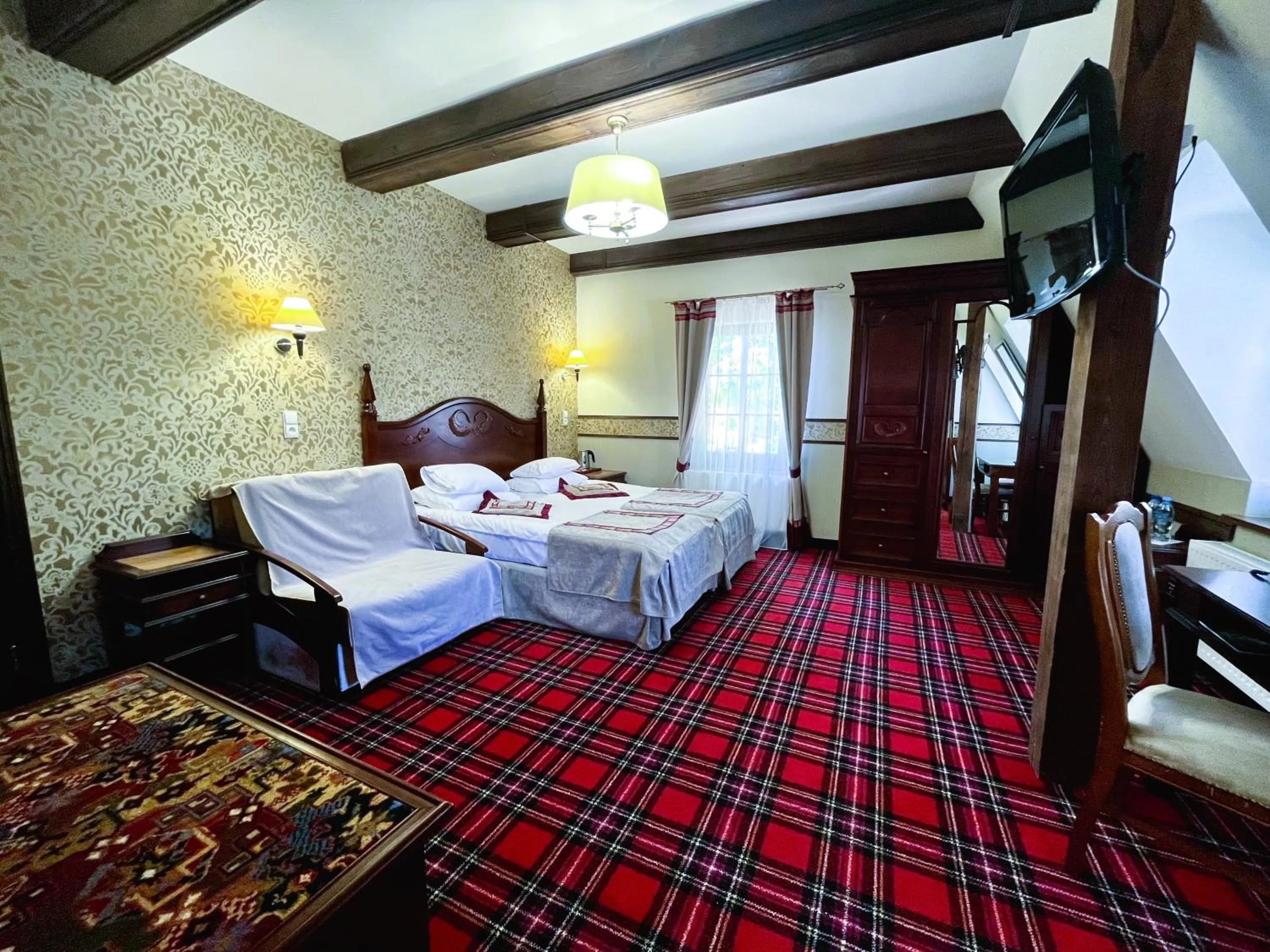 Photo of the whole room, Bed in Gościniec Ryński Młyn