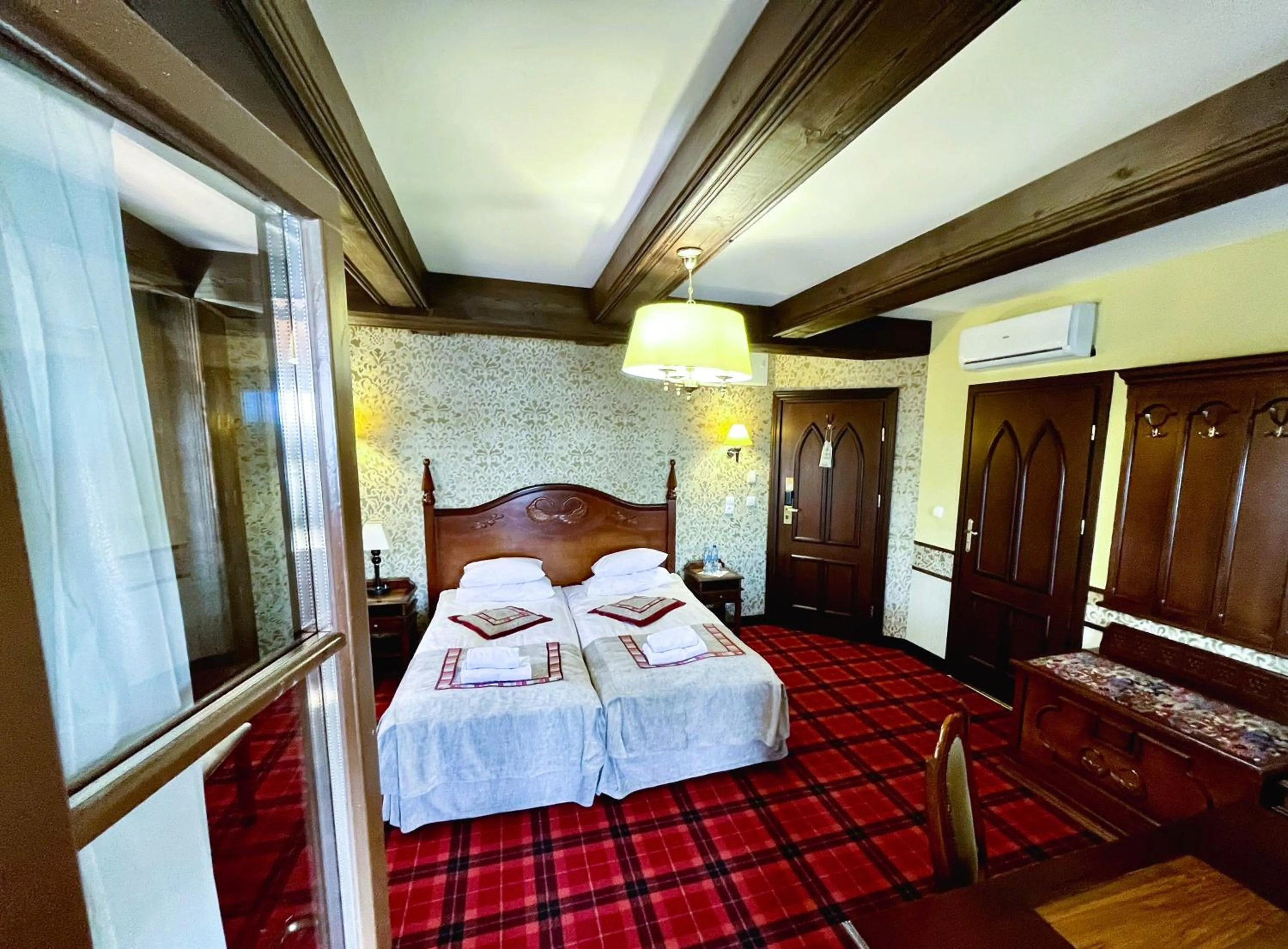 Photo of the whole room, Bed in Gościniec Ryński Młyn