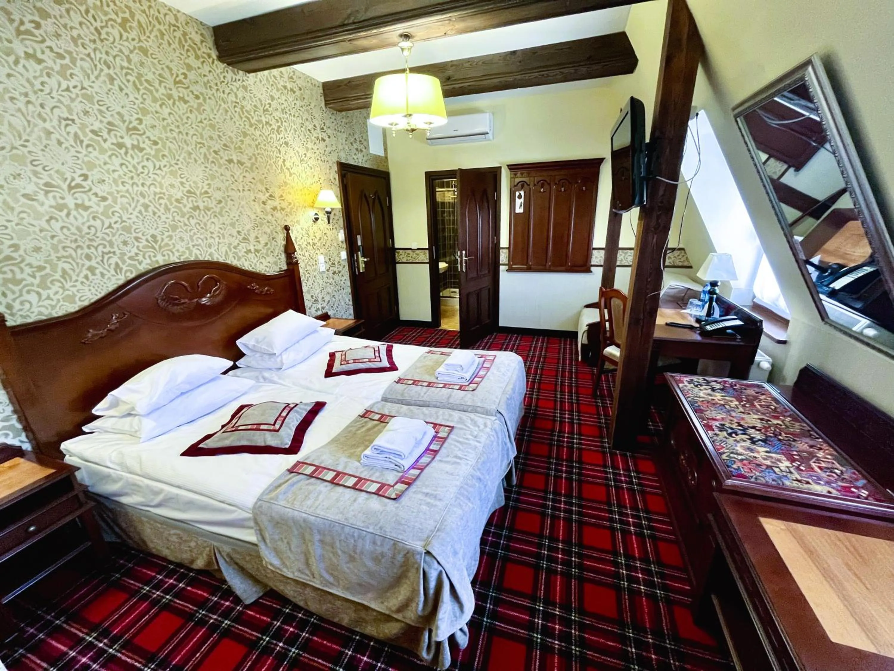 Photo of the whole room, Bed in Gościniec Ryński Młyn