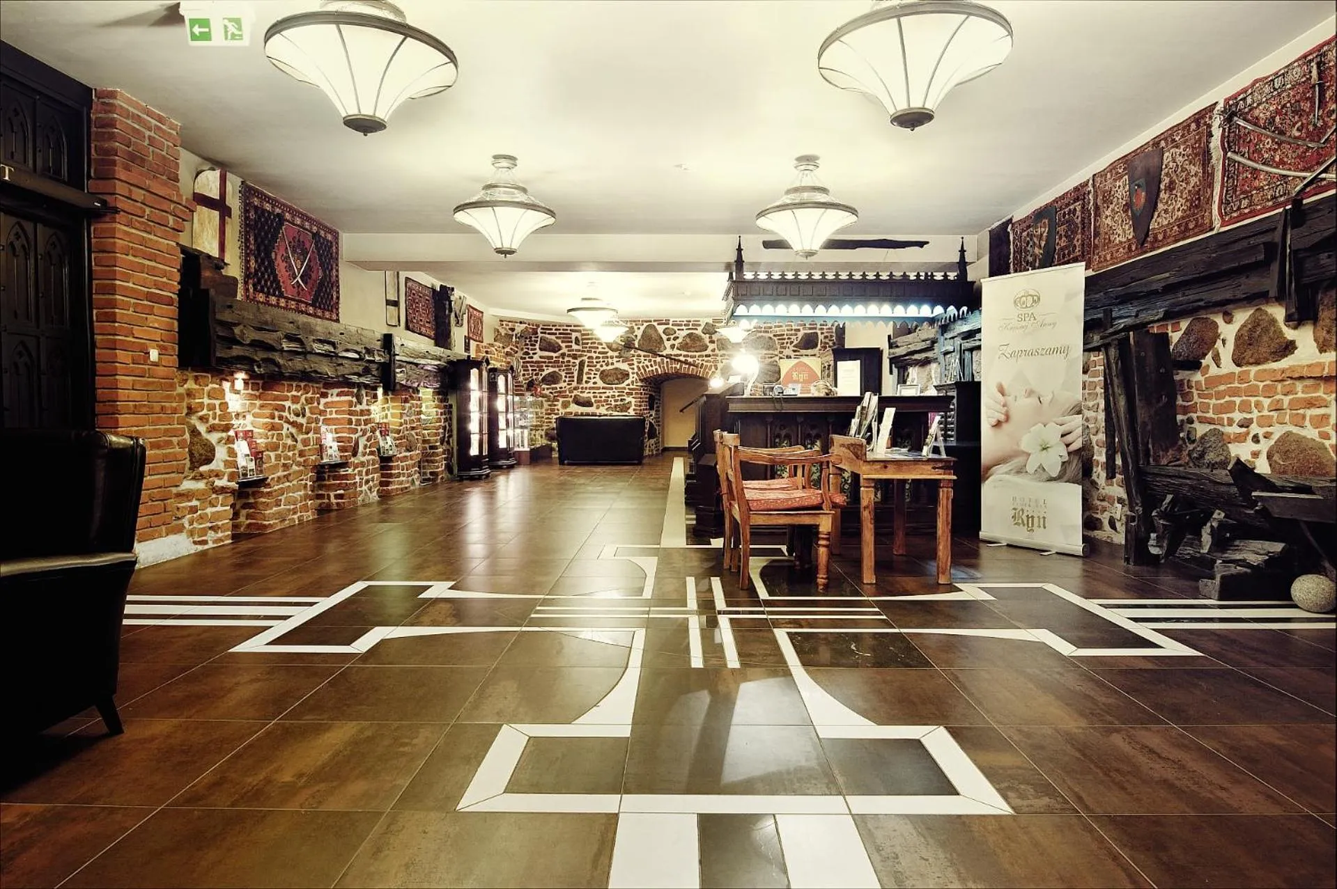 Lobby or reception in Gościniec Ryński Młyn