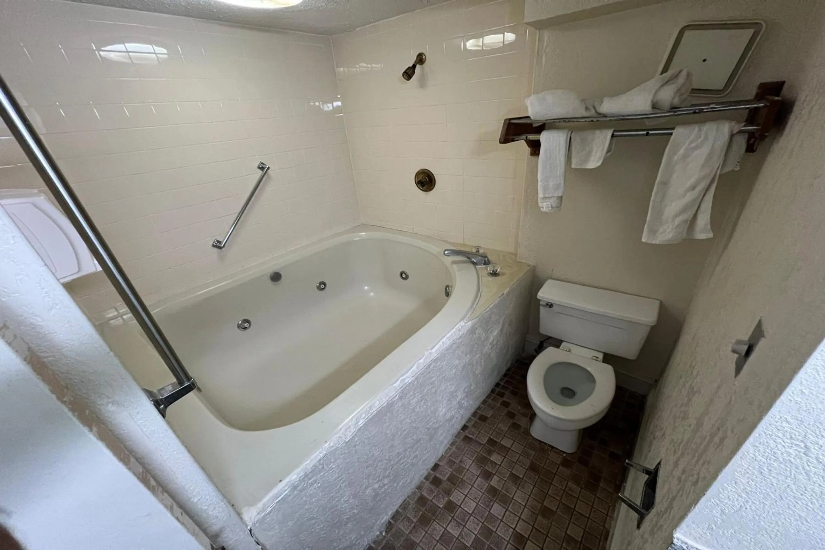 Bathroom in Super Inn & Suites by OYO Milledgeville