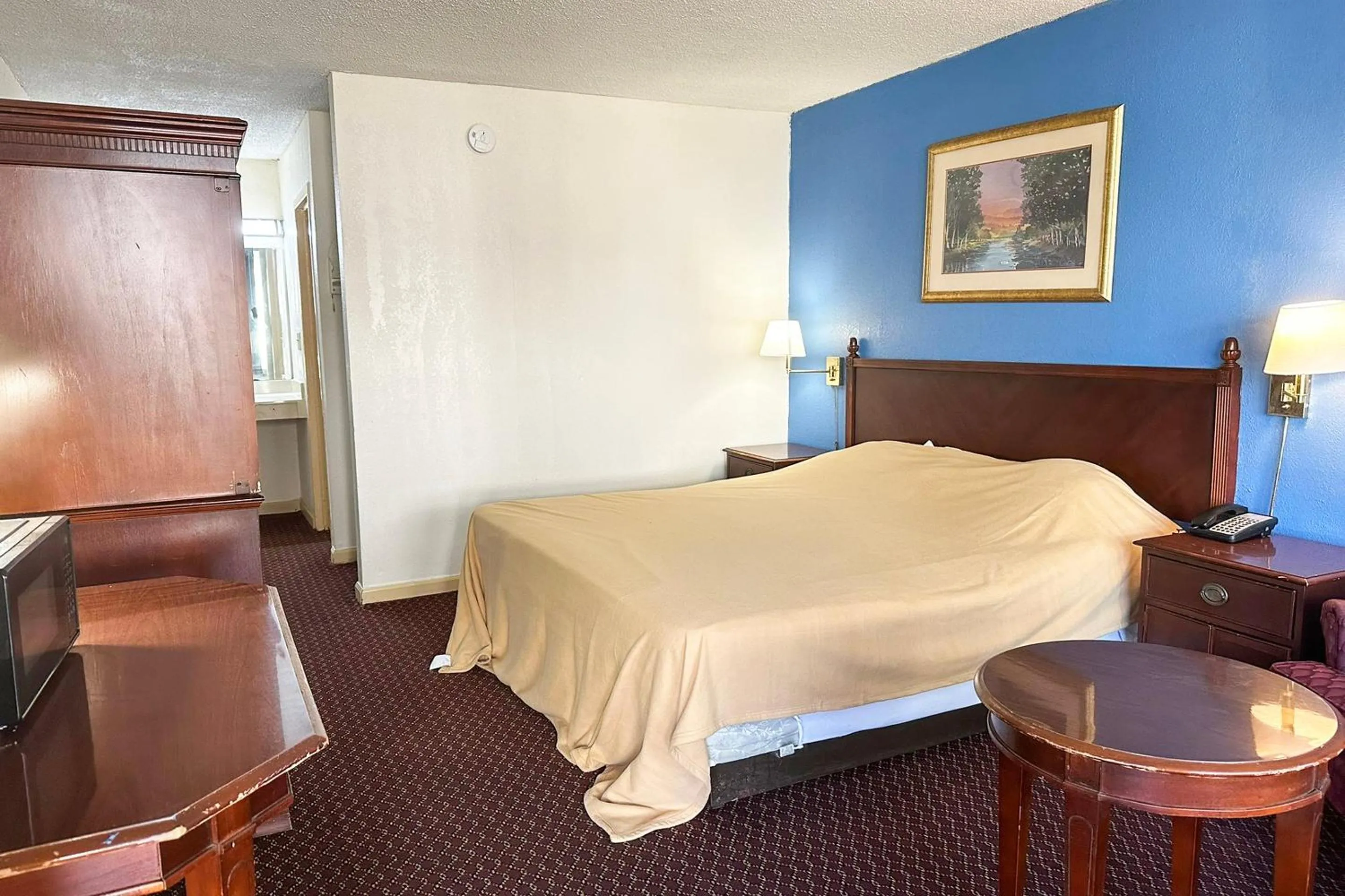 Bedroom, Bed in Super Inn & Suites by OYO Milledgeville