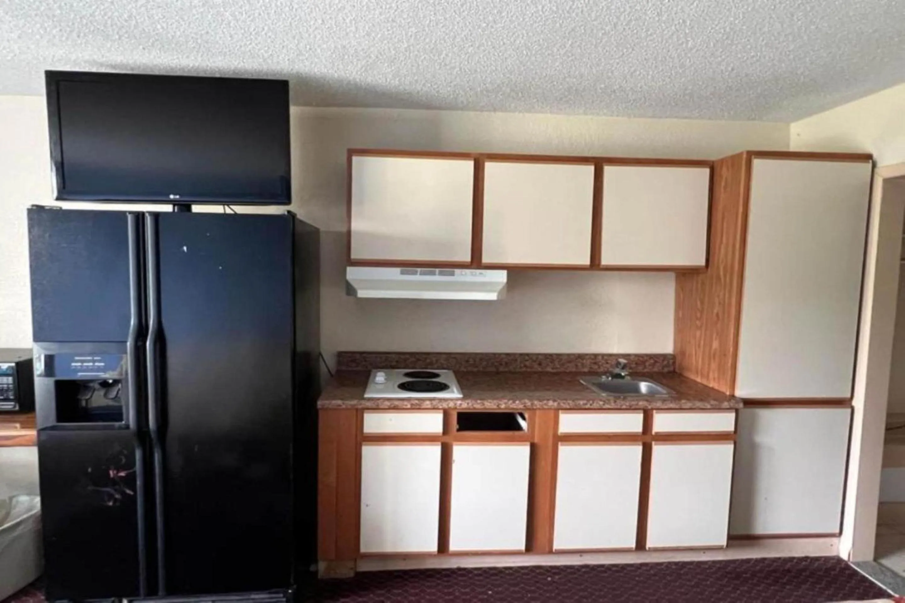 Kitchen or kitchenette in Super Inn & Suites by OYO Milledgeville