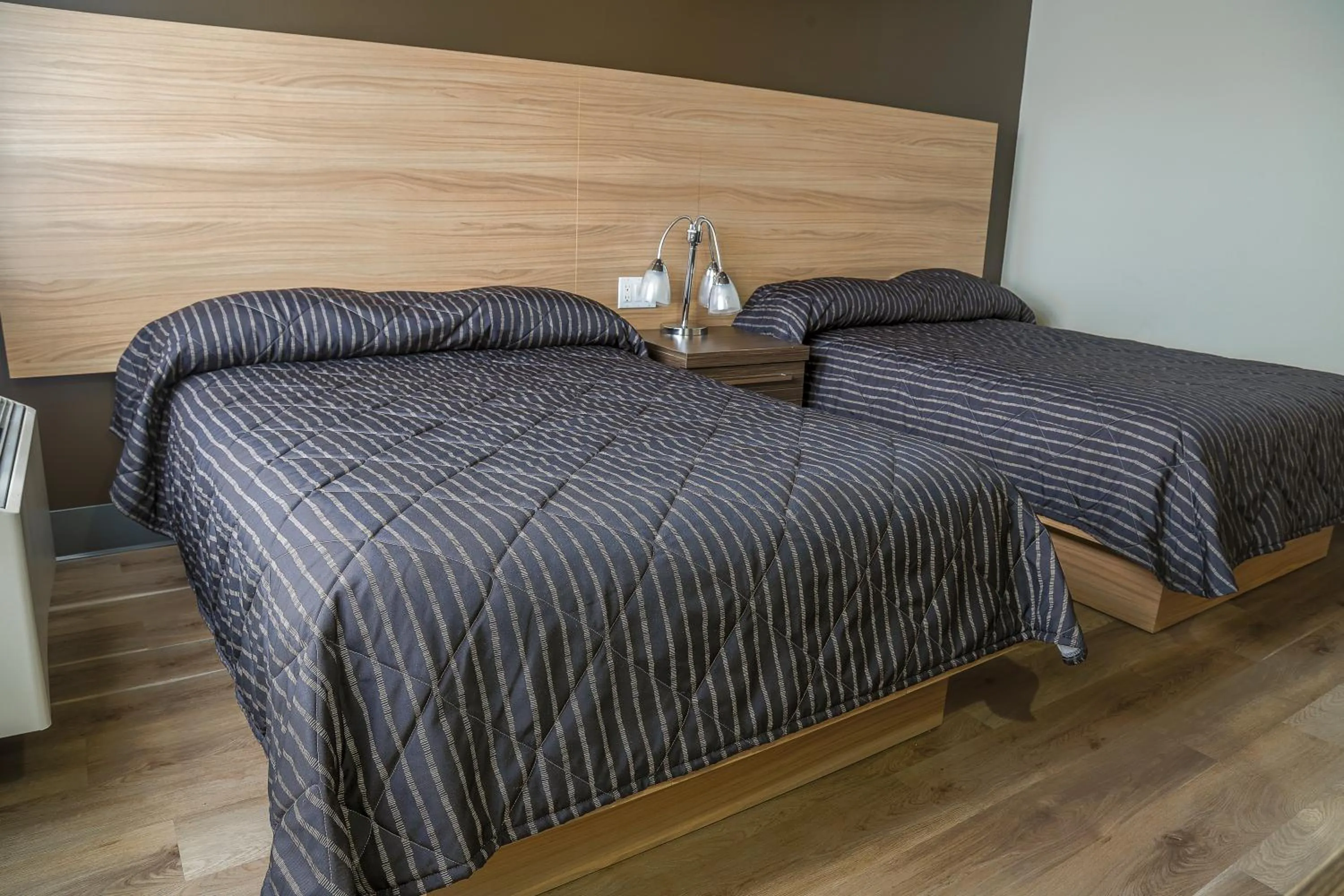 Bed in Complexe Hotelier Le 55