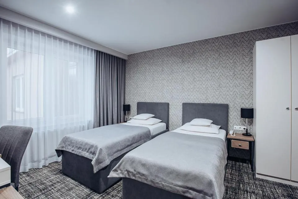 Bed in Miejsca noclegowe i Restauracja Kamiński