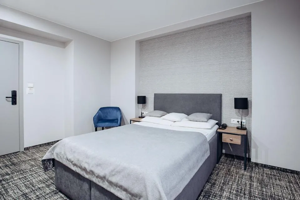 Bed in Miejsca noclegowe i Restauracja Kamiński