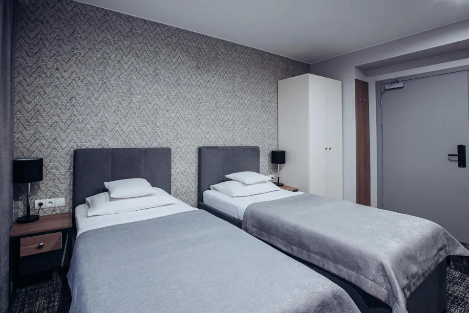 Bed in Miejsca noclegowe i Restauracja Kamiński