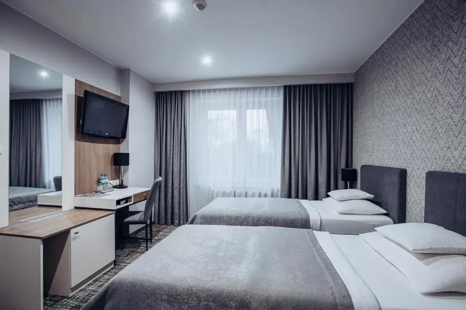 Deluxe Twin Room - single occupancy in Miejsca noclegowe i Restauracja Kamiński Deluxe Twin Room - single occupancy in Miejsca noclegowe i Restauracja Kamiński