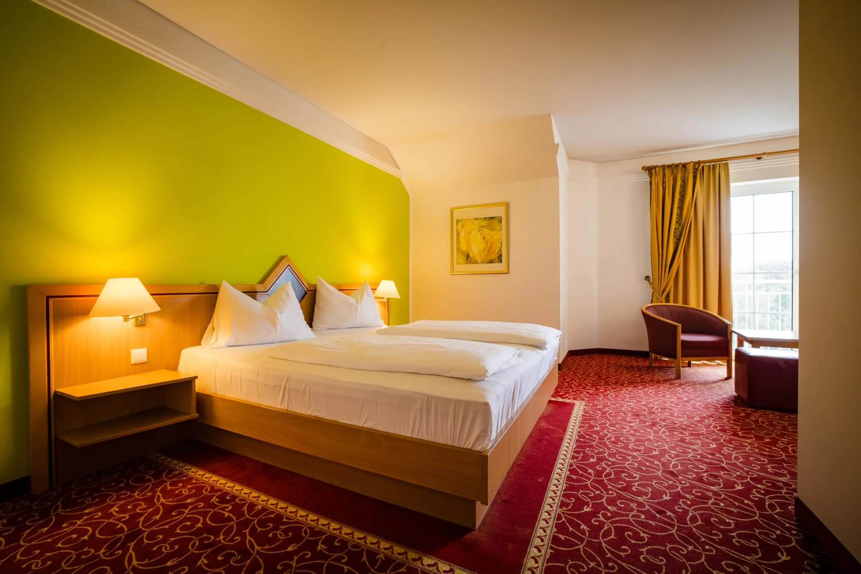 Bed in Thermenhotel Vier Jahreszeiten