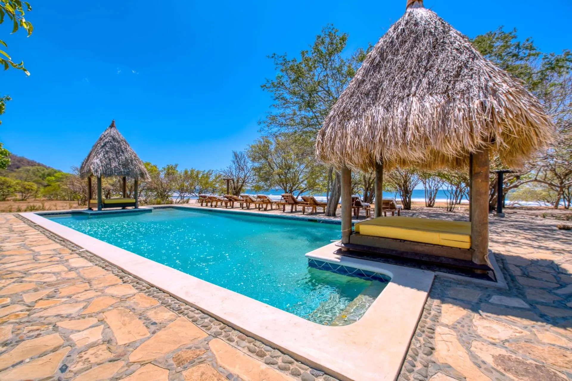 Swimming pool in Hotel Punta Teonoste Boutique Beachfront Resort