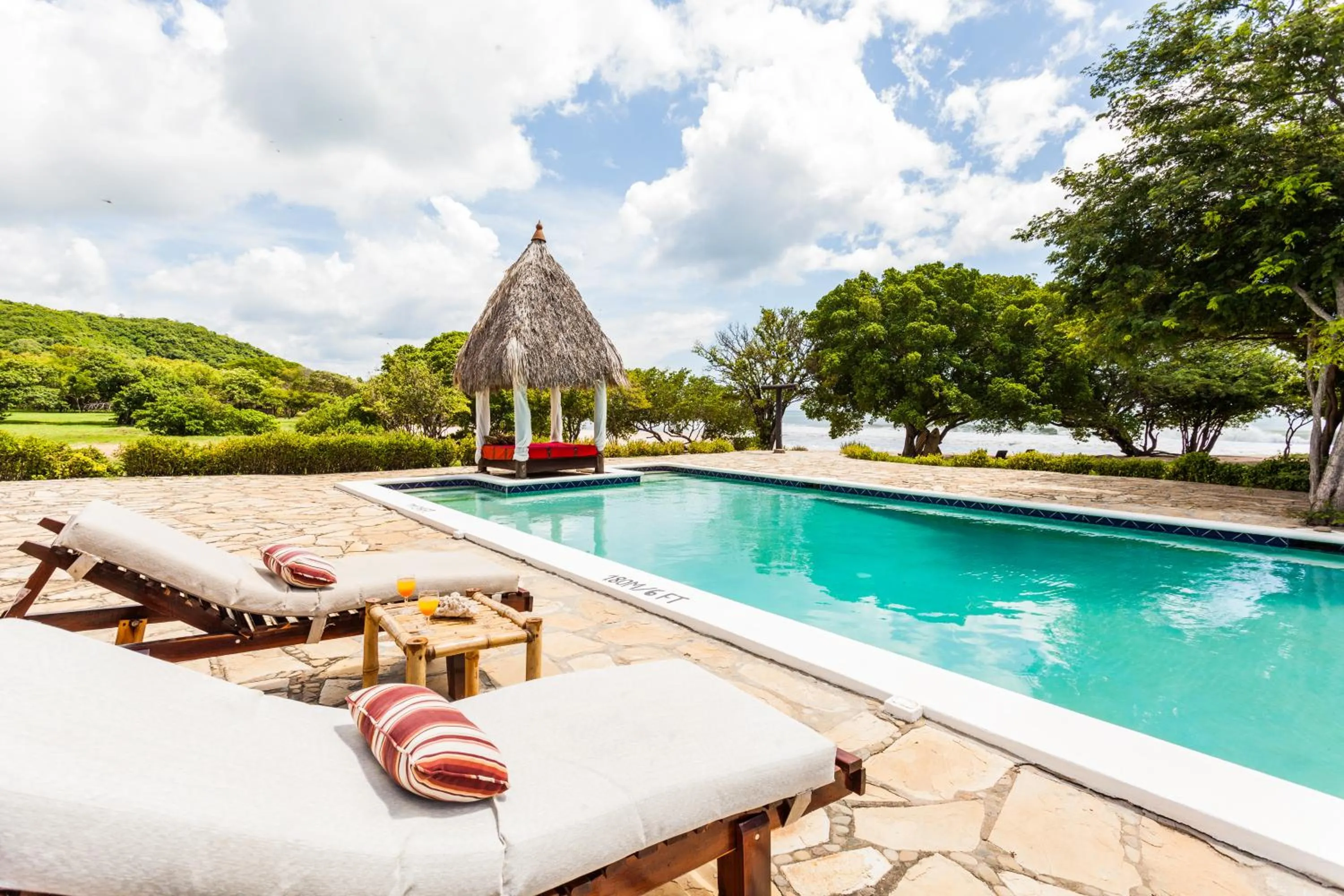 Swimming pool in Hotel Punta Teonoste Boutique Beachfront Resort