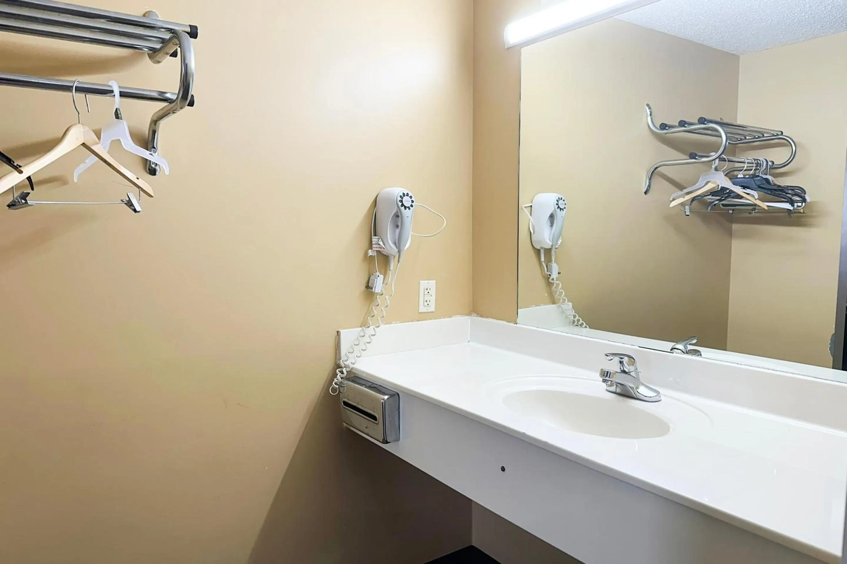 Bathroom in Garden Inn & Suites