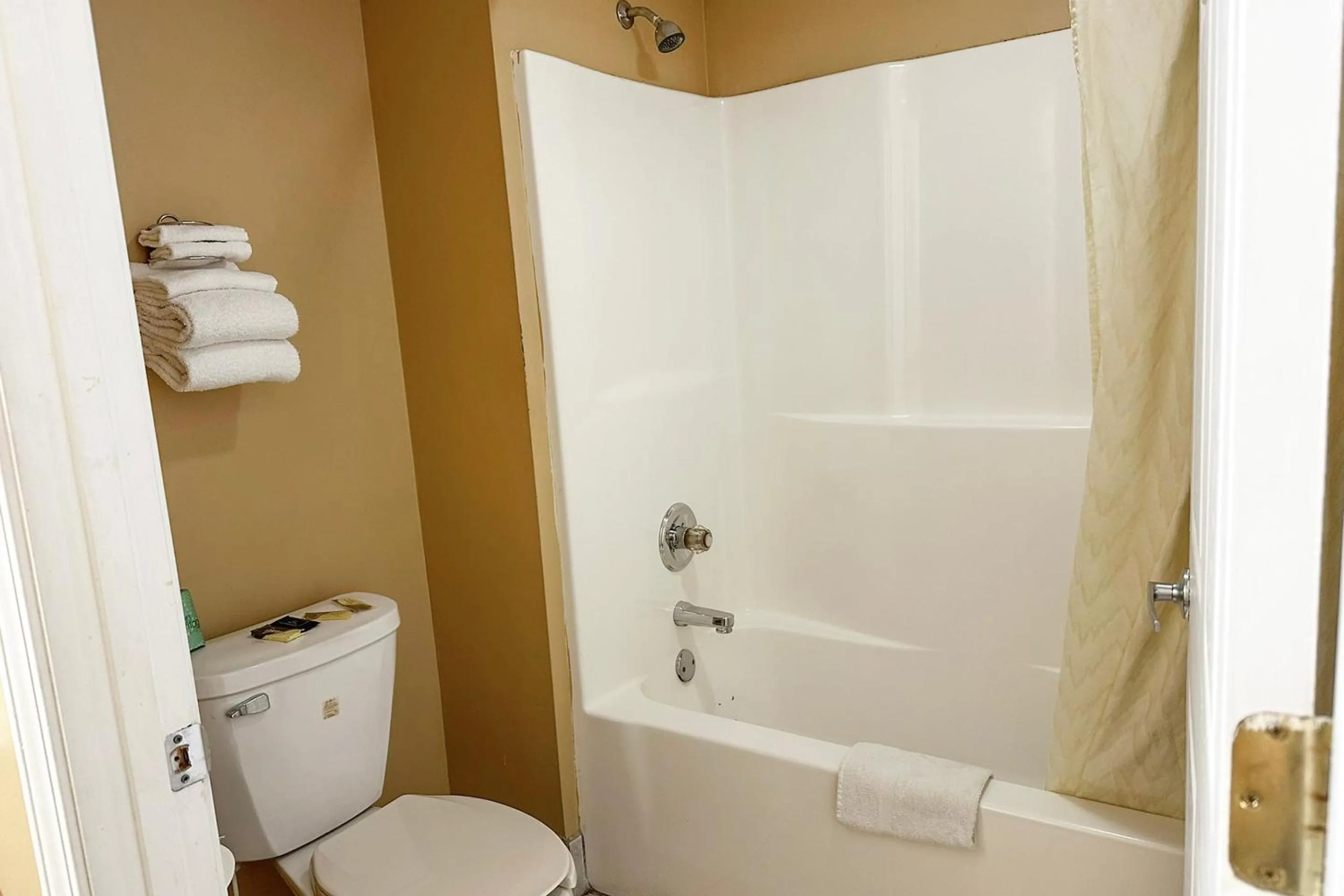 Bathroom in Garden Inn & Suites