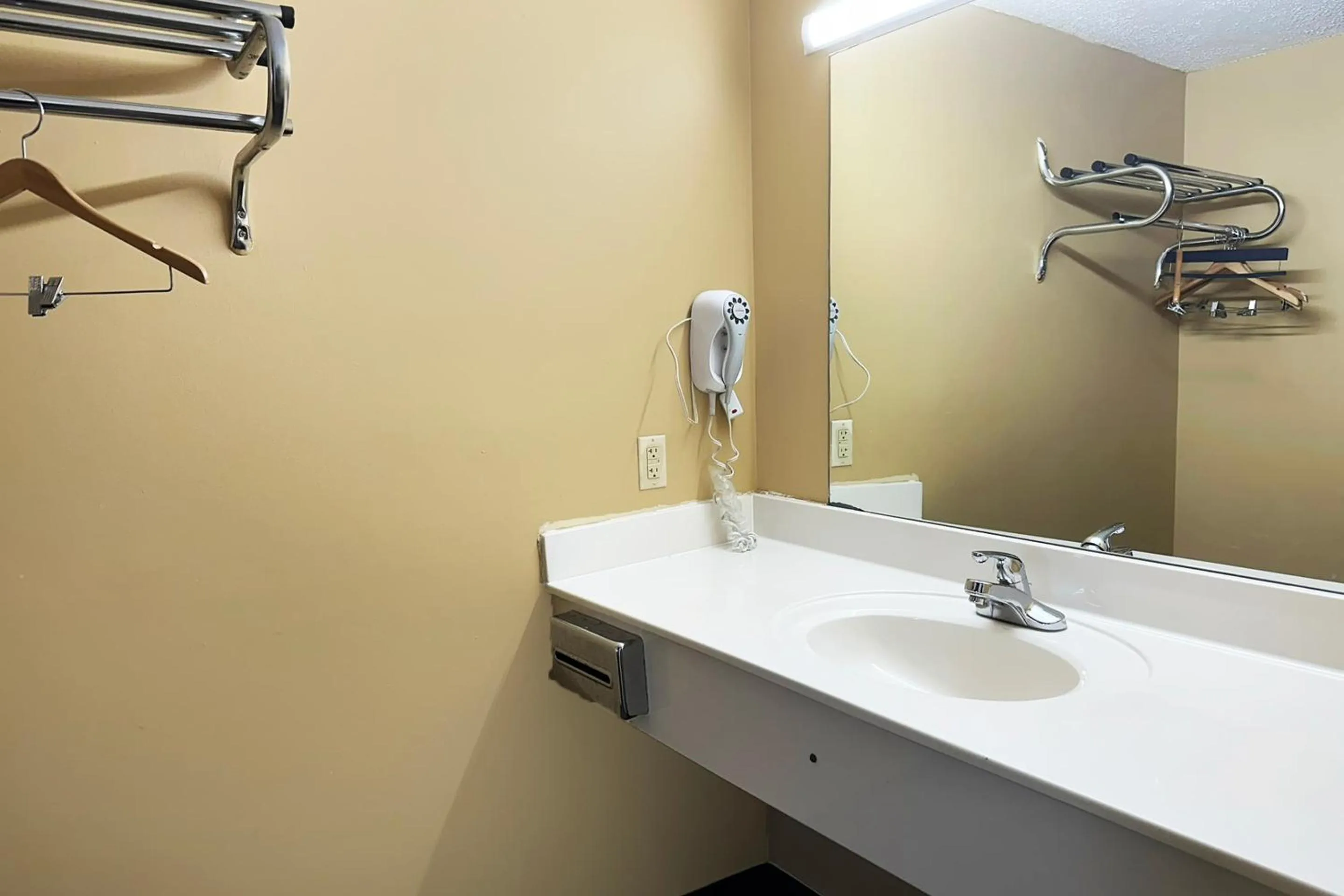 Bathroom in Garden Inn & Suites