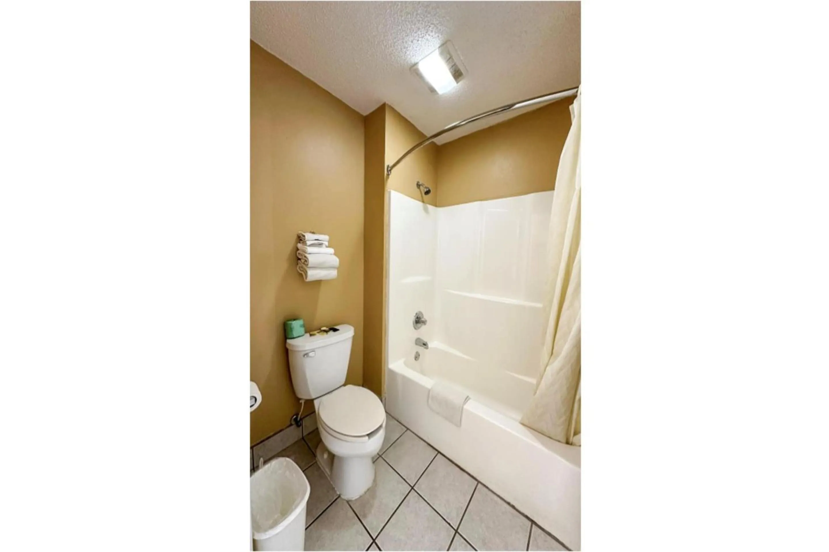 Bathroom in Garden Inn & Suites