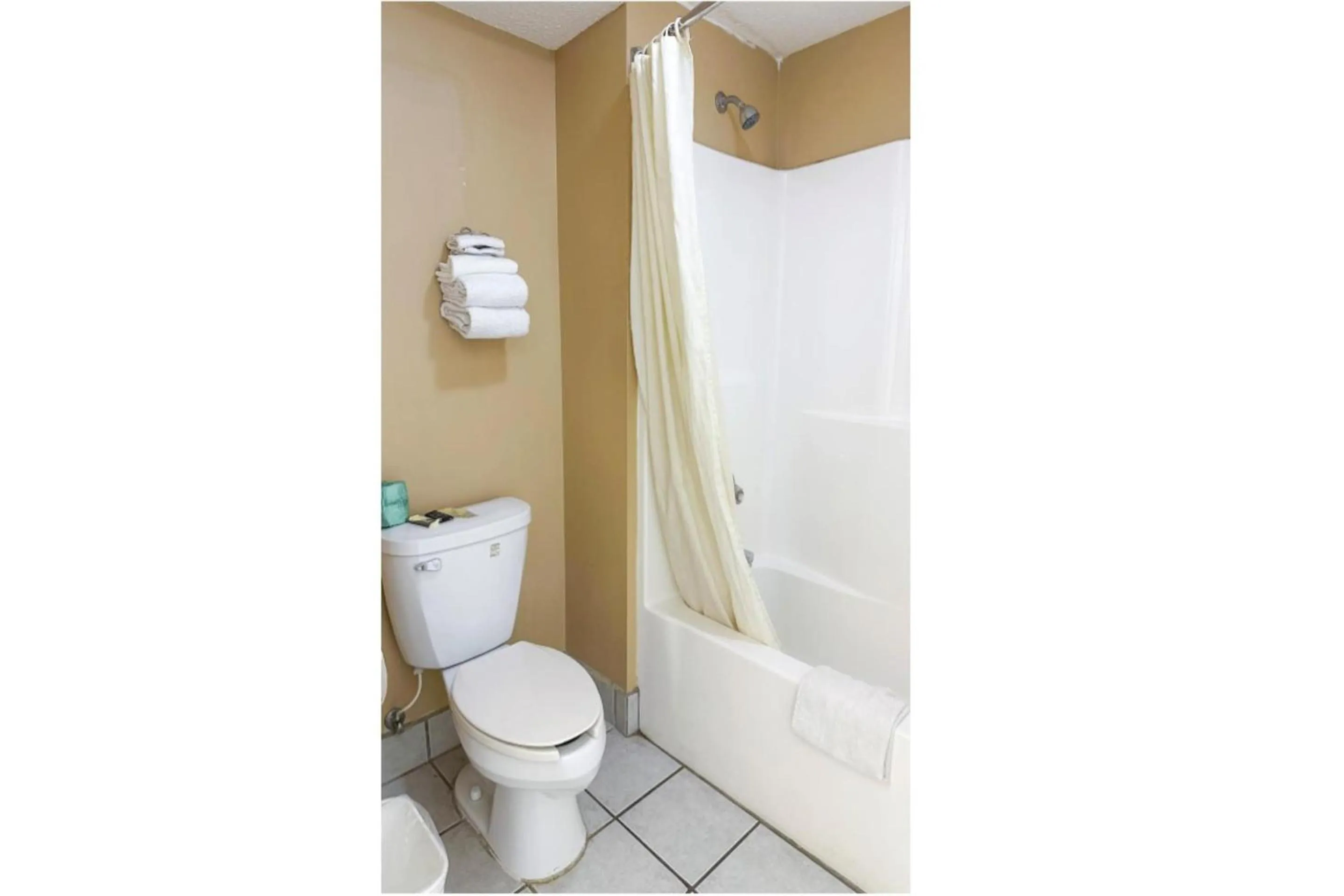 Bathroom in Garden Inn & Suites