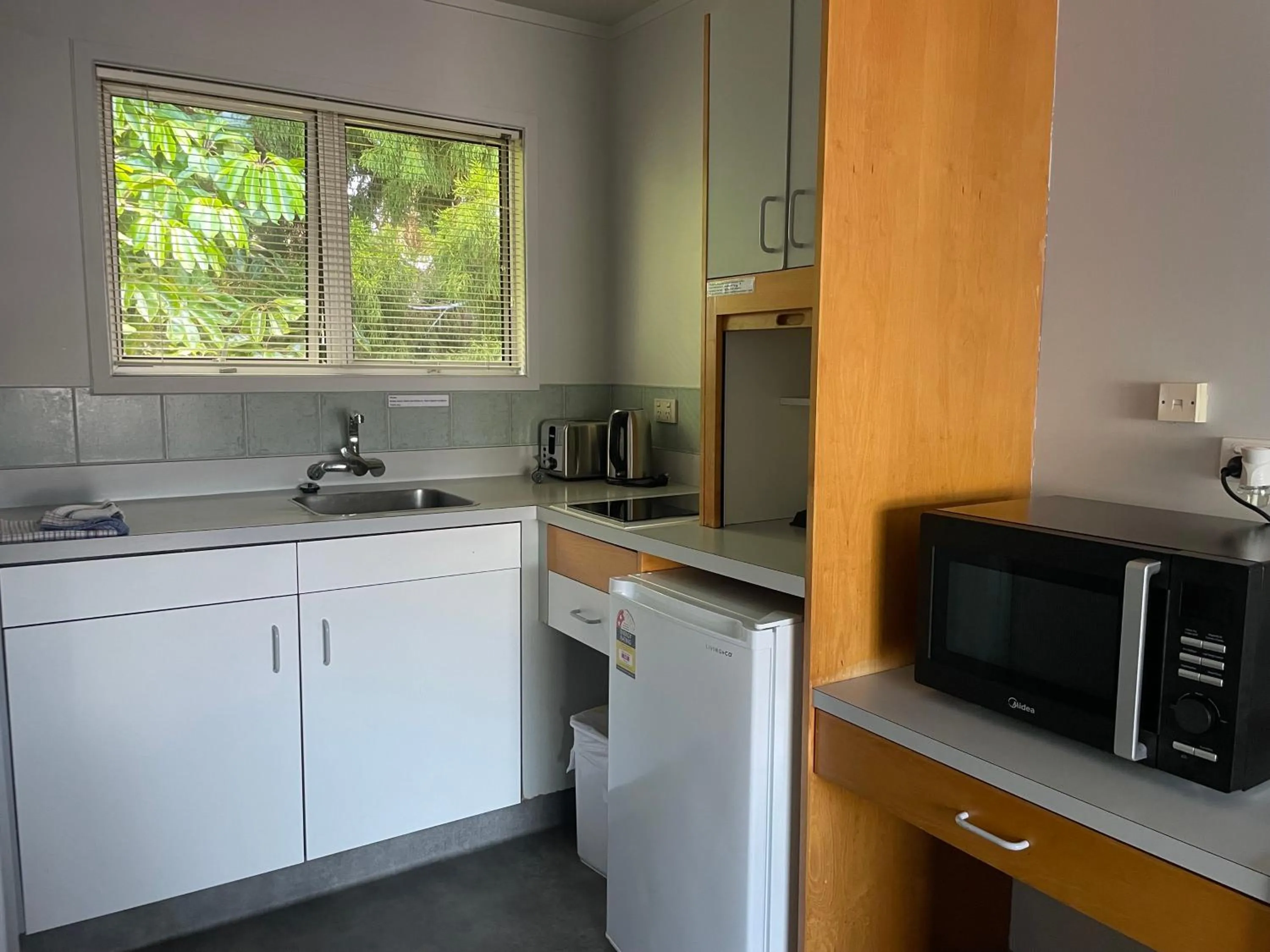 Kitchen or kitchenette in Aaron Court Motel Whangarei