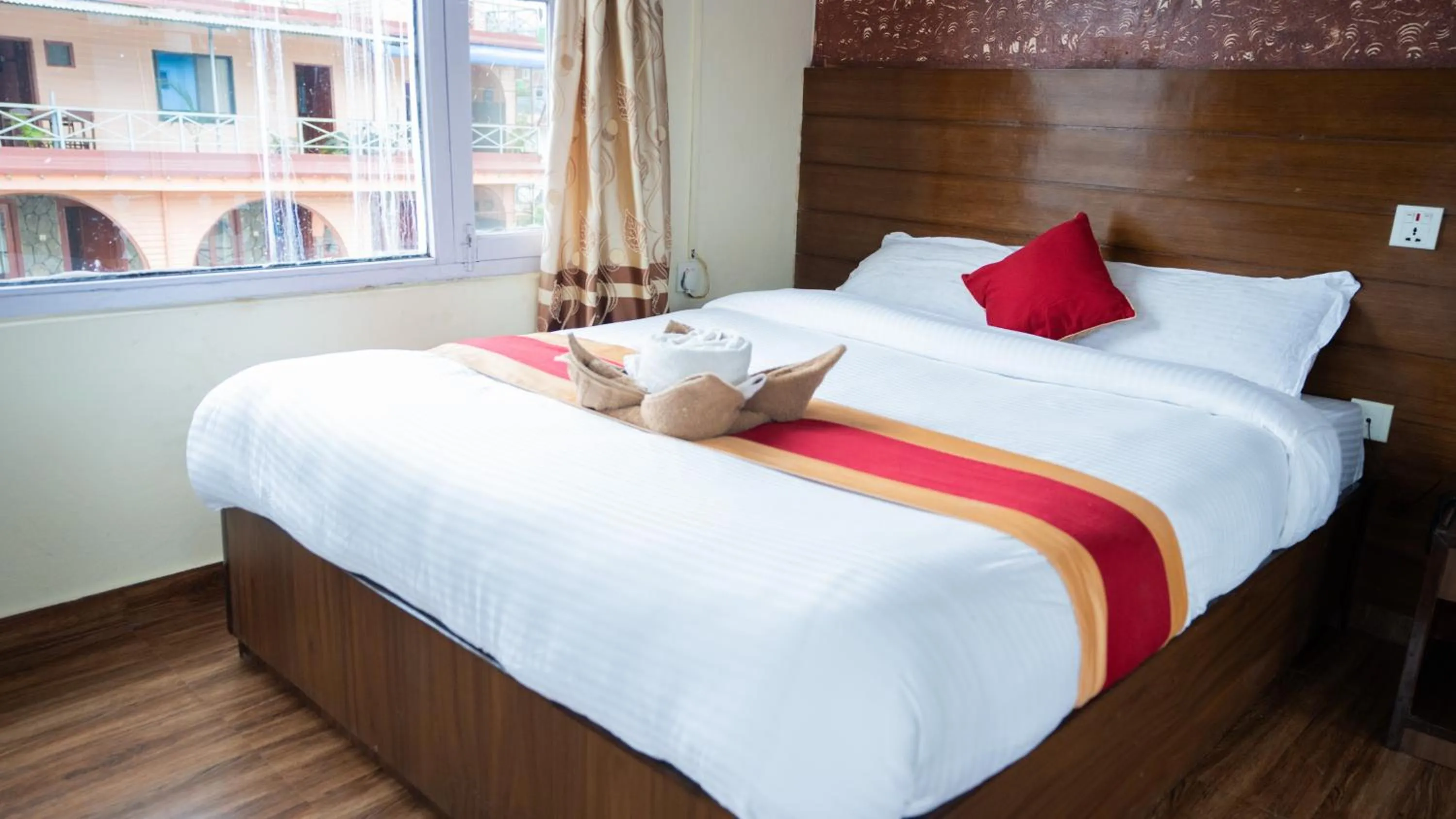 Bed in Hotel Himalayan Inn