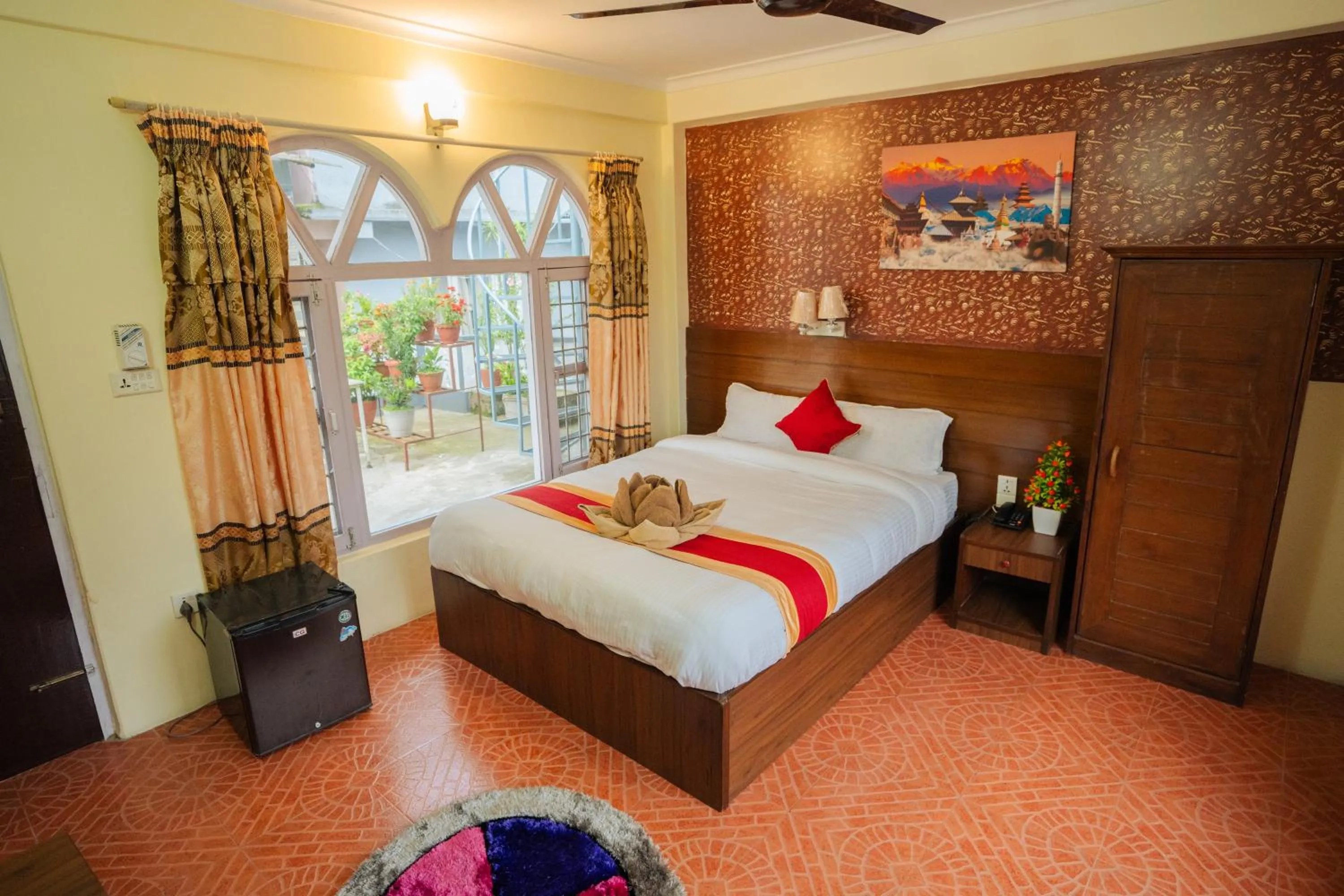 Bed in Hotel Himalayan Inn