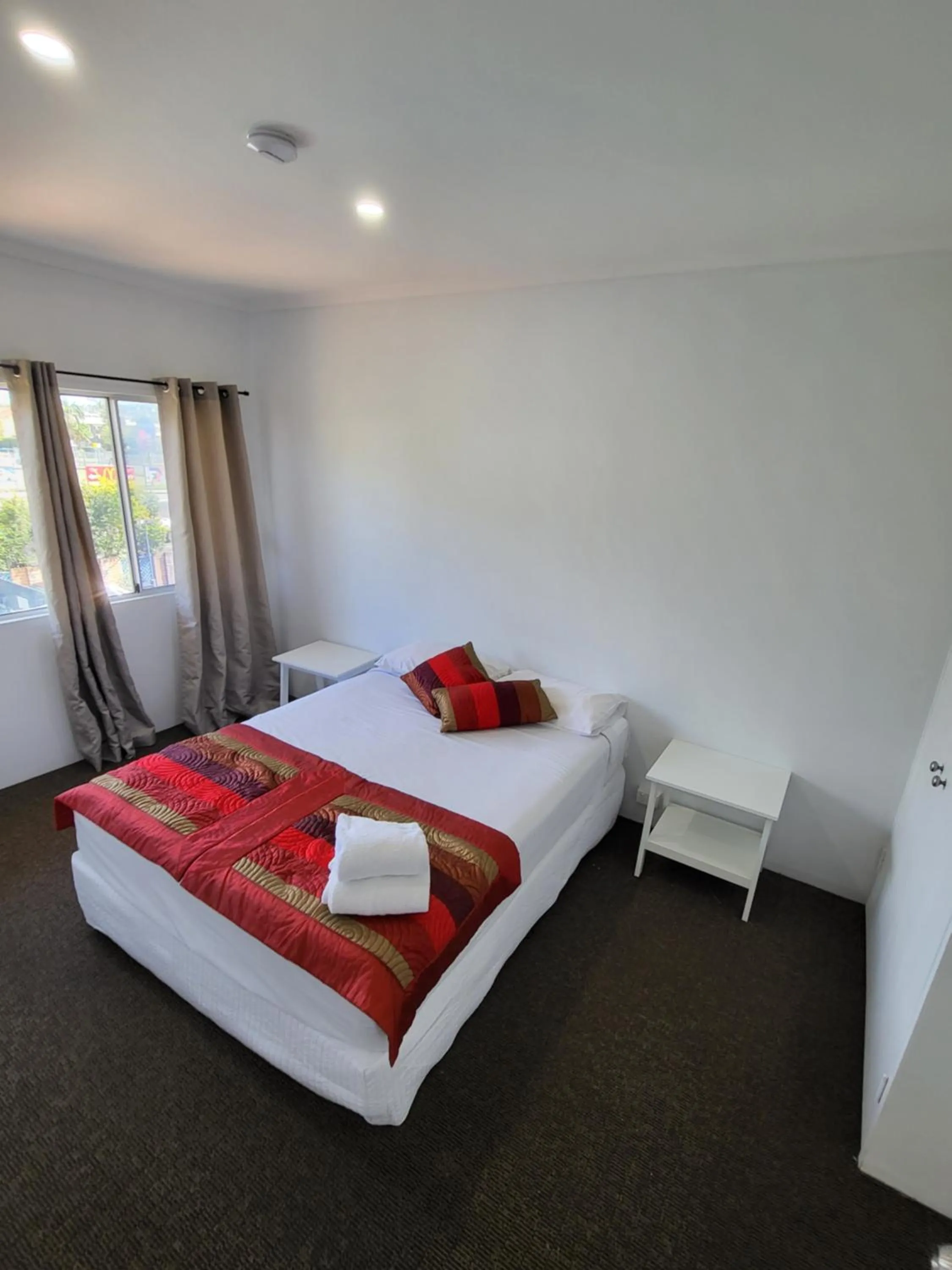 Bedroom in Central Motel Mooloolaba and Apartments