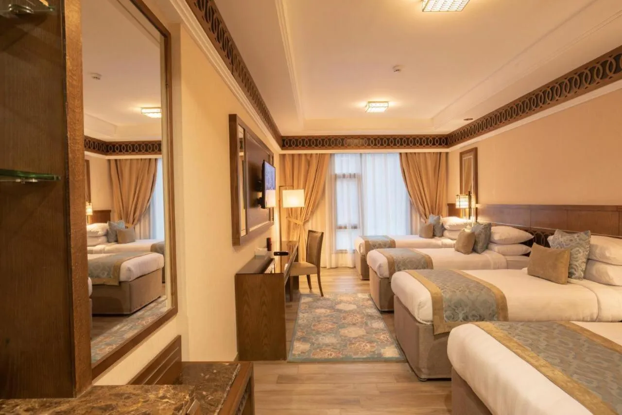 Bed in Violet Al Azizia Hotel MASJID Al Qatari