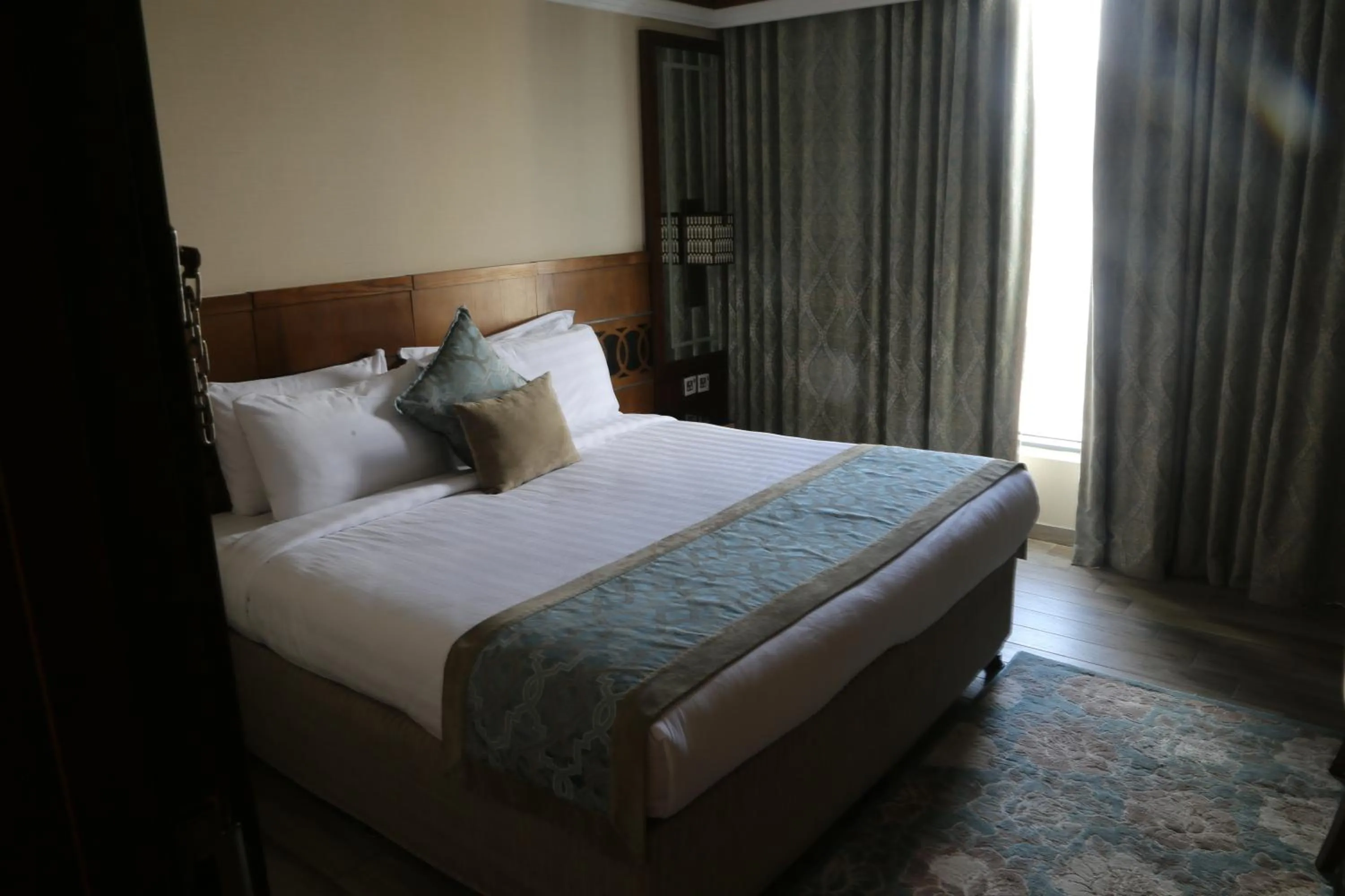 Bed in Violet Al Azizia Hotel MASJID Al Qatari