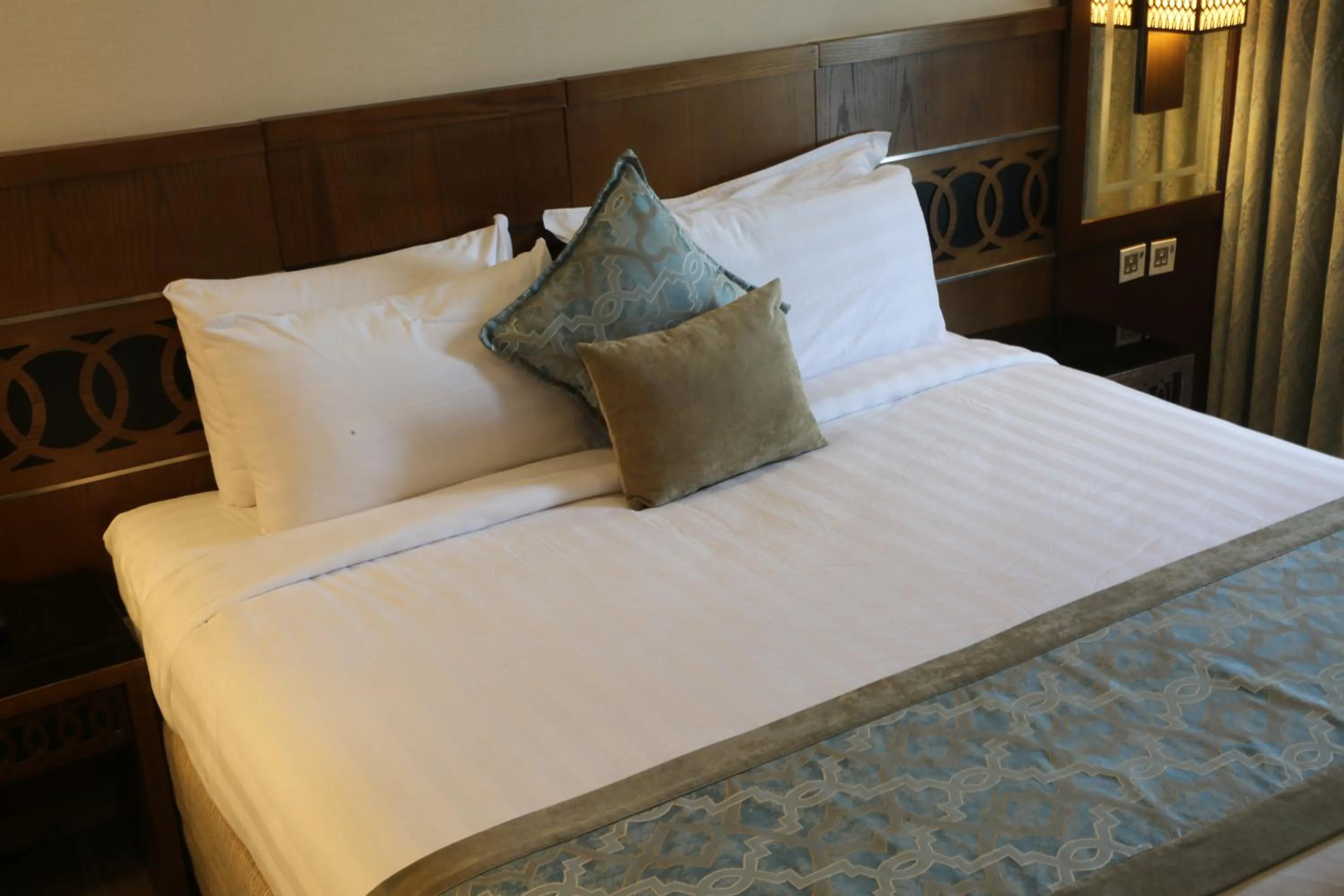 Bed in Violet Al Azizia Hotel MASJID Al Qatari