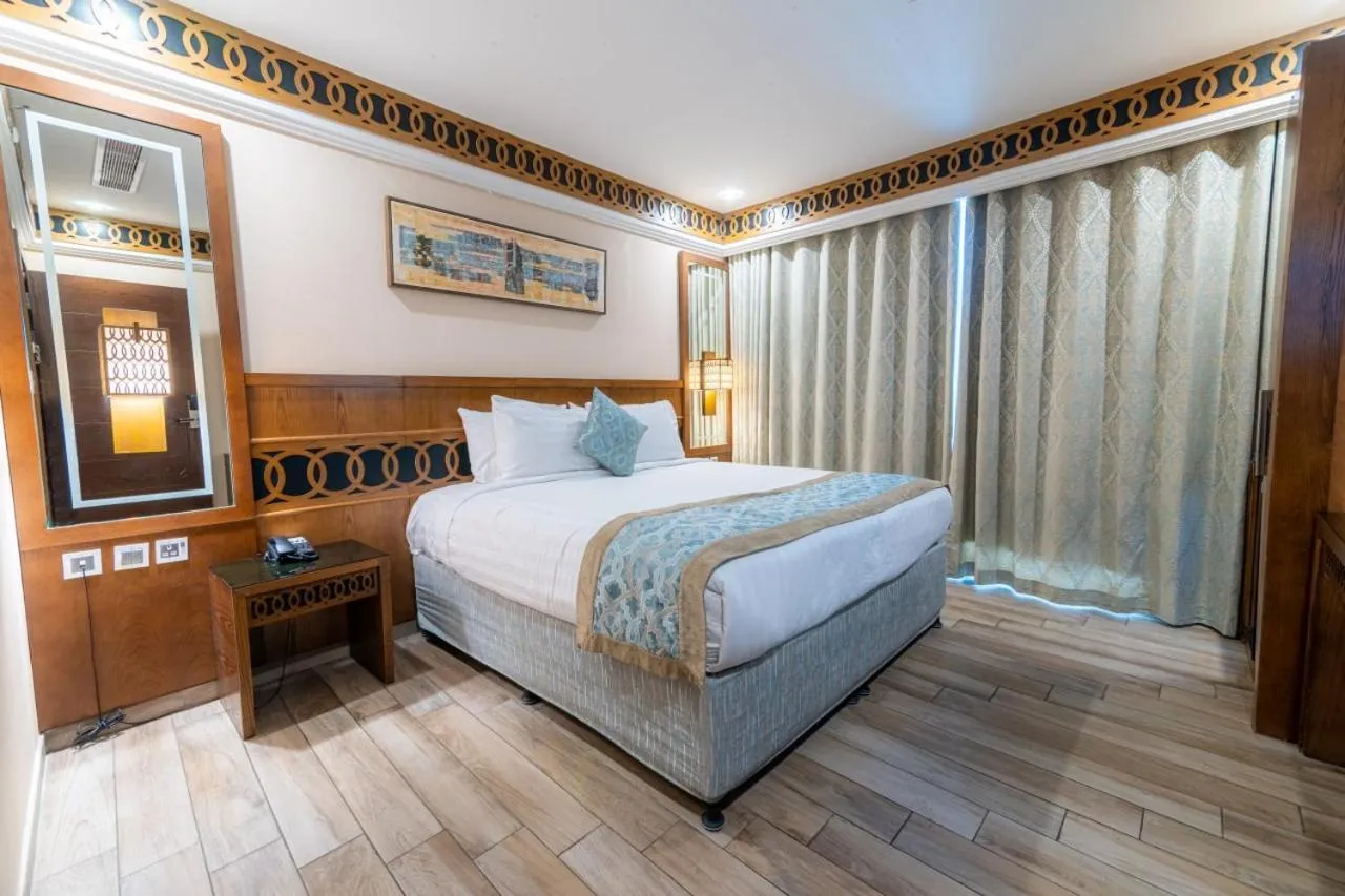 Bed in Violet Al Azizia Hotel MASJID Al Qatari